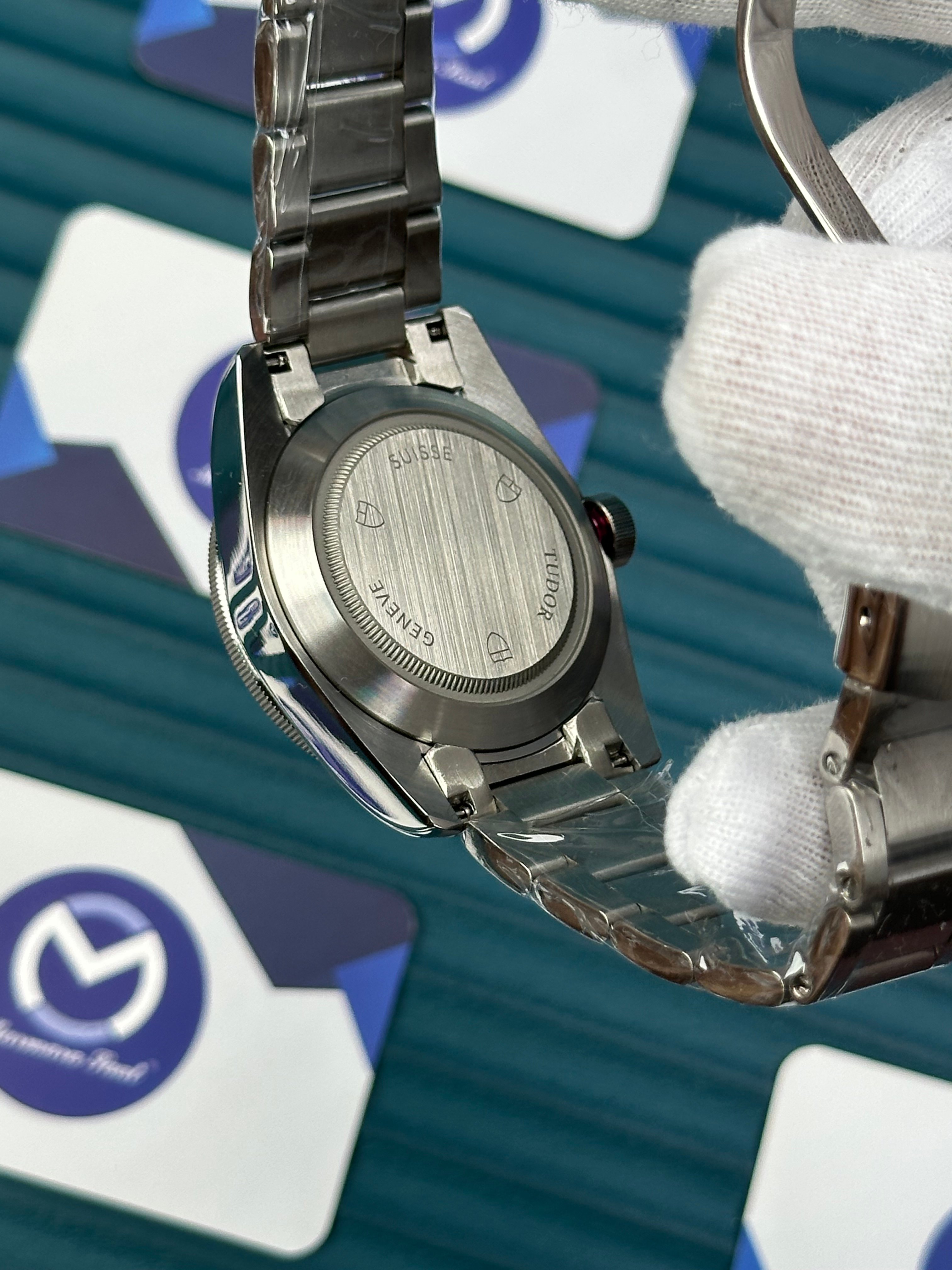 TUDOR BLACK DIAL BLUE BEZEL SILVER