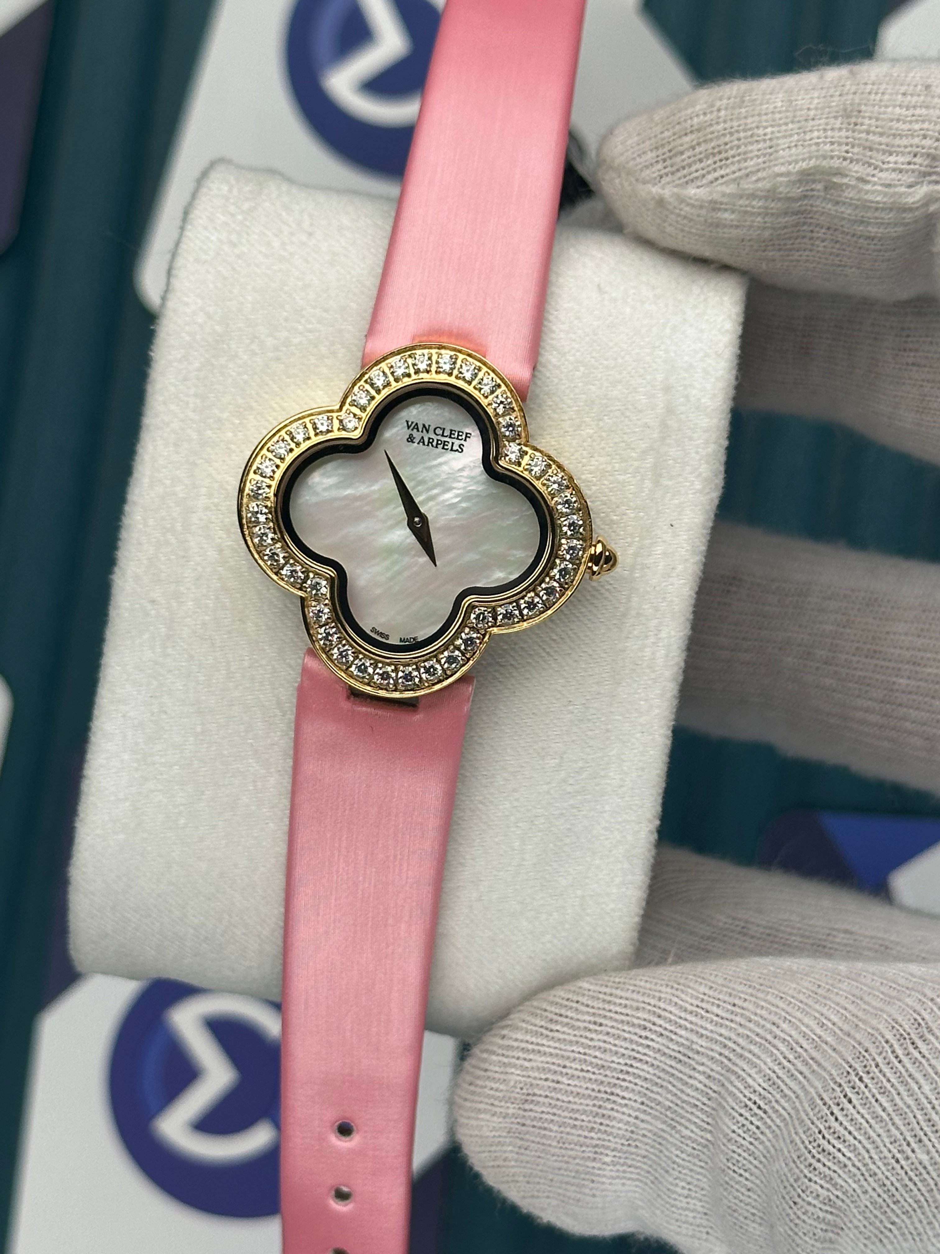 VAN CLEEF & ARPELS WHITE DIAL DIAMOND BEZEL GOLD CASE PINK LEATHER CORD
