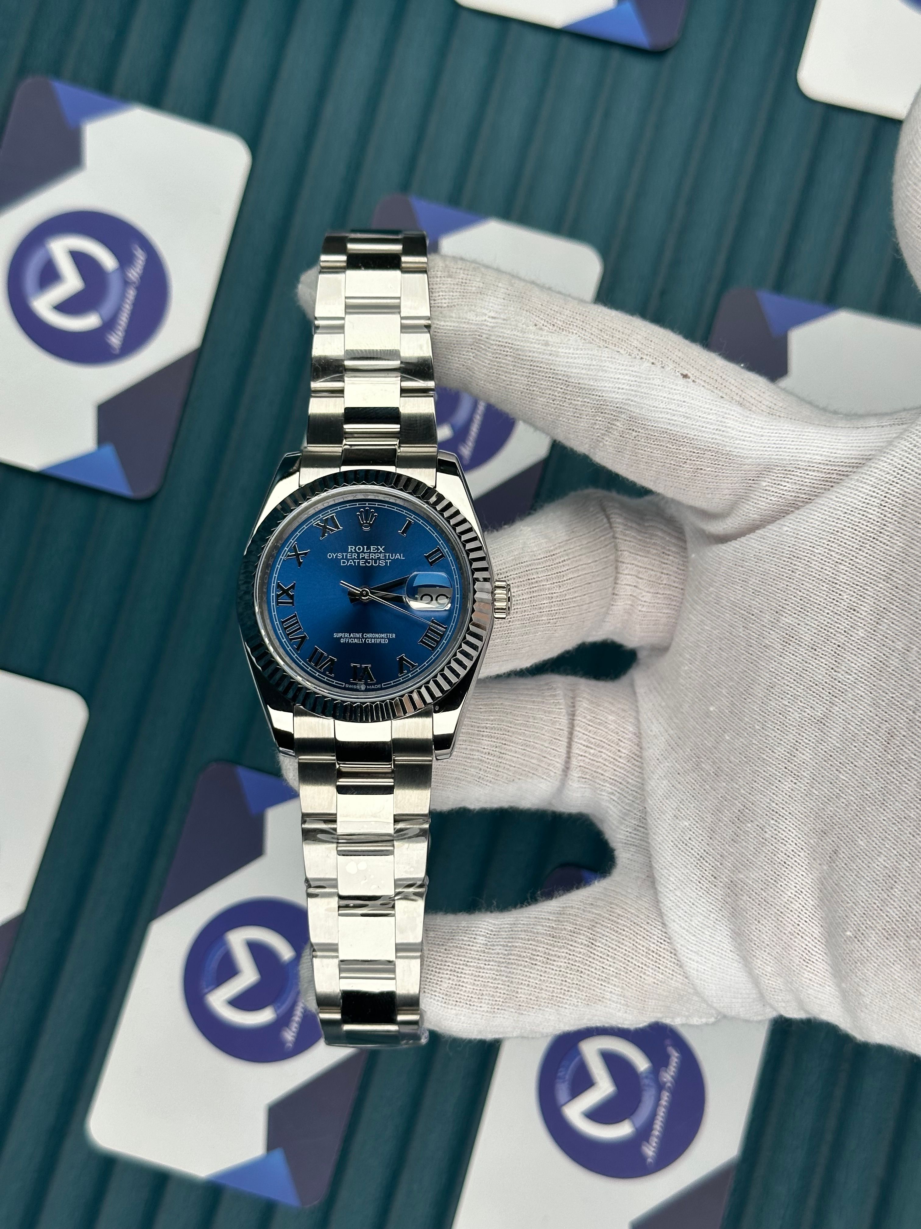 ROLEX DATEJUST BLUE DIAL ROMA INDEX SILVER OYSTER