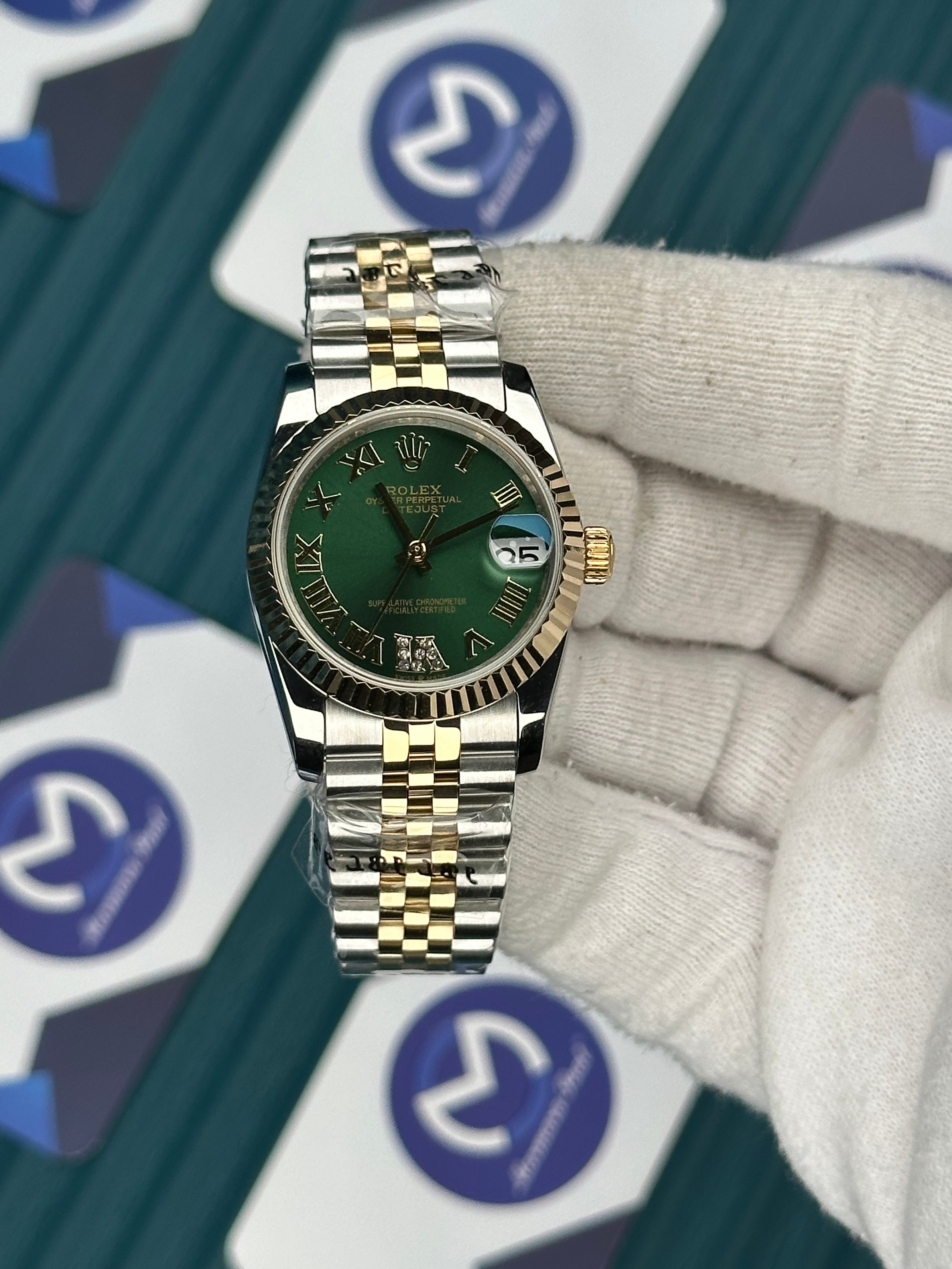 ROLEX 31 GREEN DIAL GOLD-SILVER JUBILEE