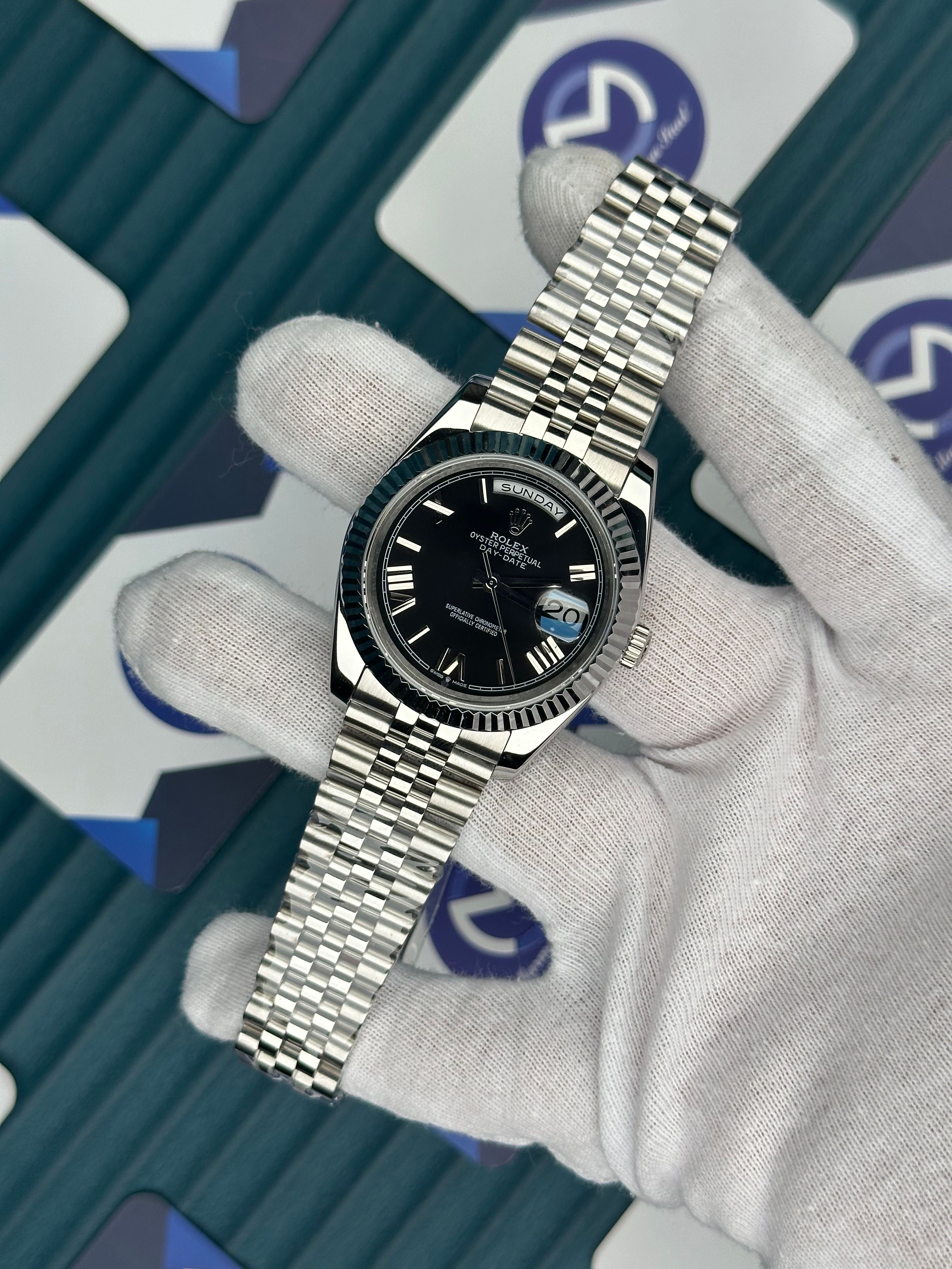ROLEX DAY-DATE BLACK DIAL ROMA INDEX SILVER JUBILE