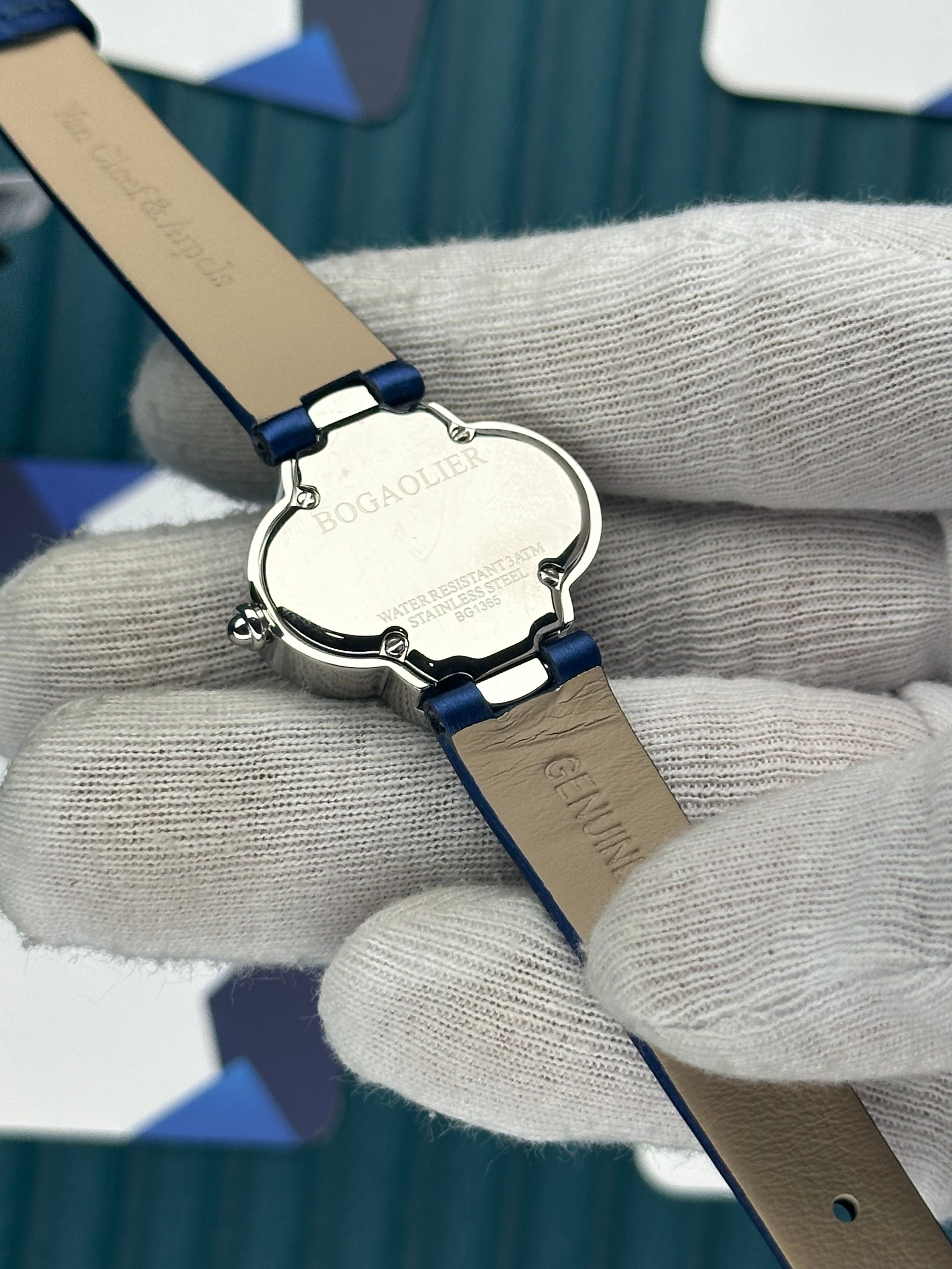 VAN CLEEF & ARPELS WHITE DIAL SILVER CASE BLUE LEATHER CORD