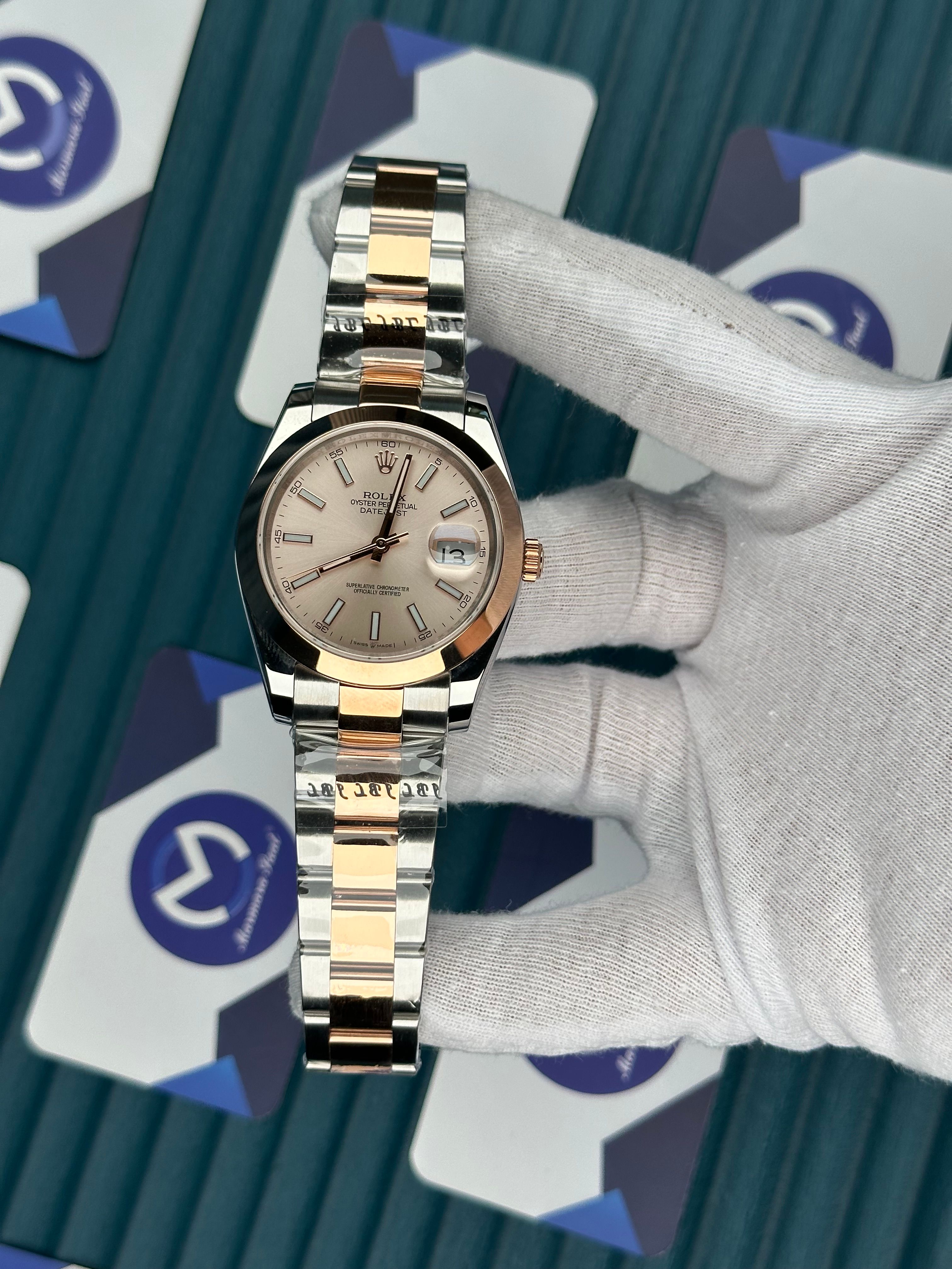 ROLEX DATEJUST OVAL BEZEL CHAMPAGNE DIAL ROSE-SILVER OYSTER