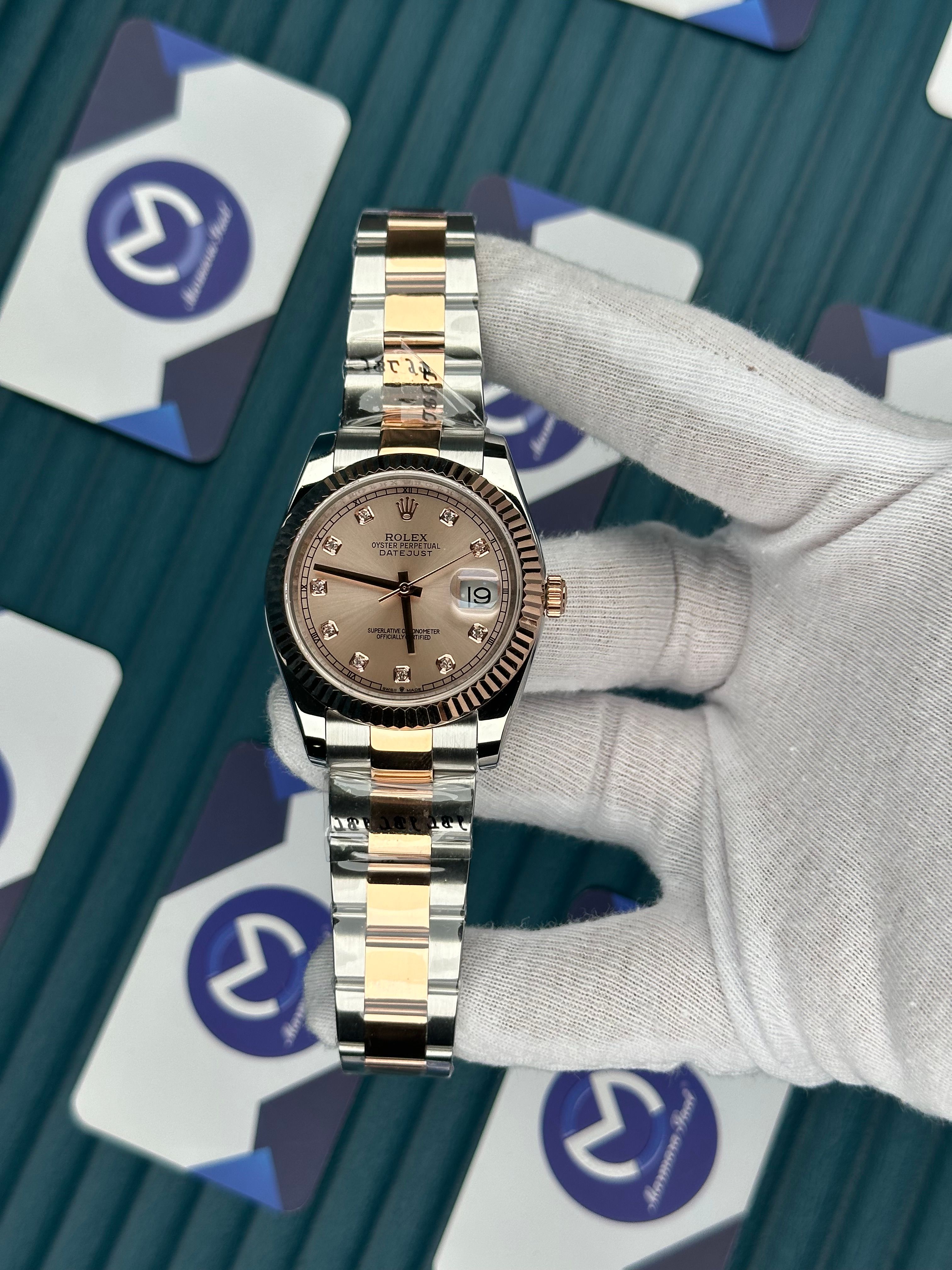 ROLEX DATEJUST CHAMPAGNE DIAL DIAMOND INDEX ROSE-SILVER OYSTER