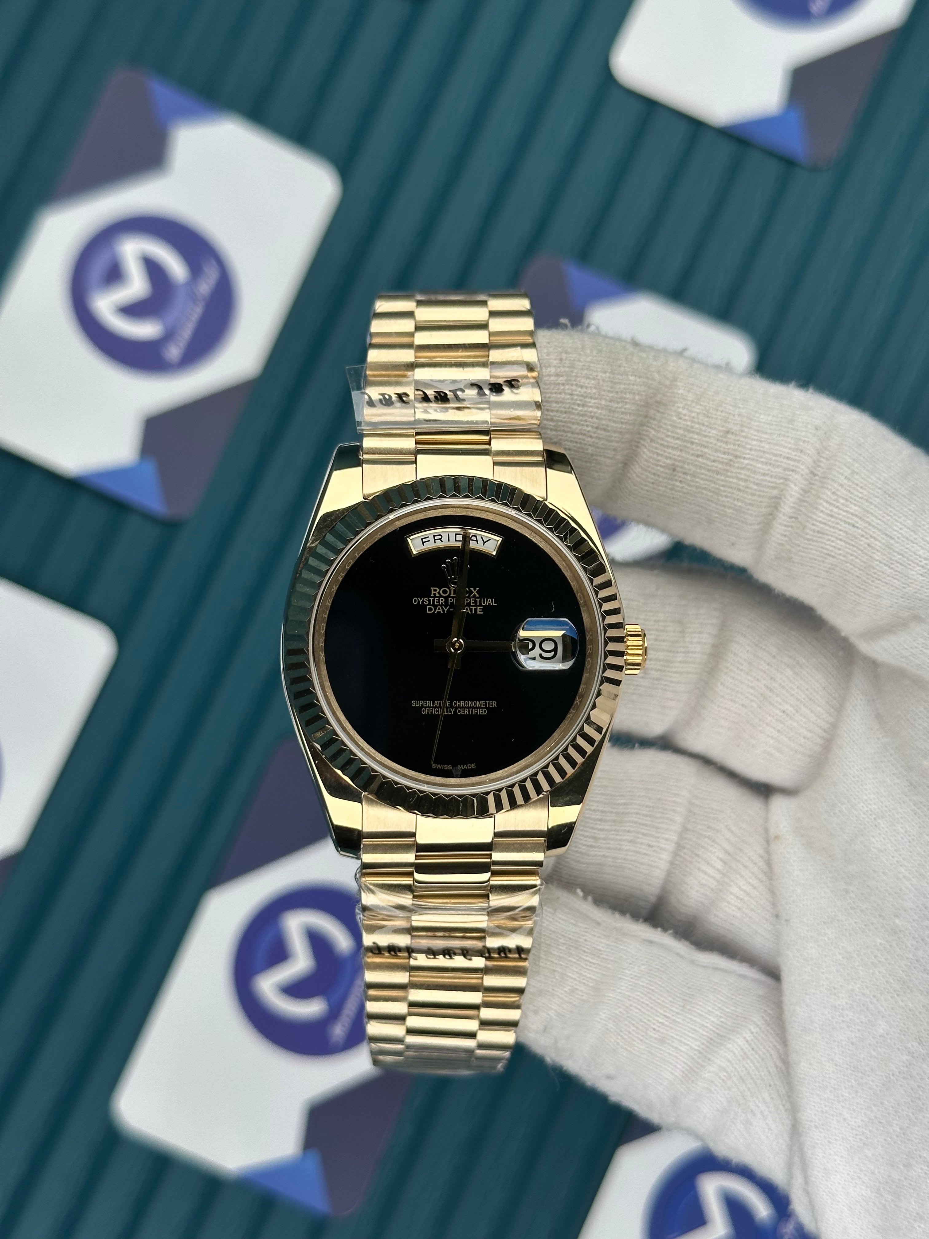 ROLEX DAY-DATE BLACK DIAL GOLD PRESIDENT