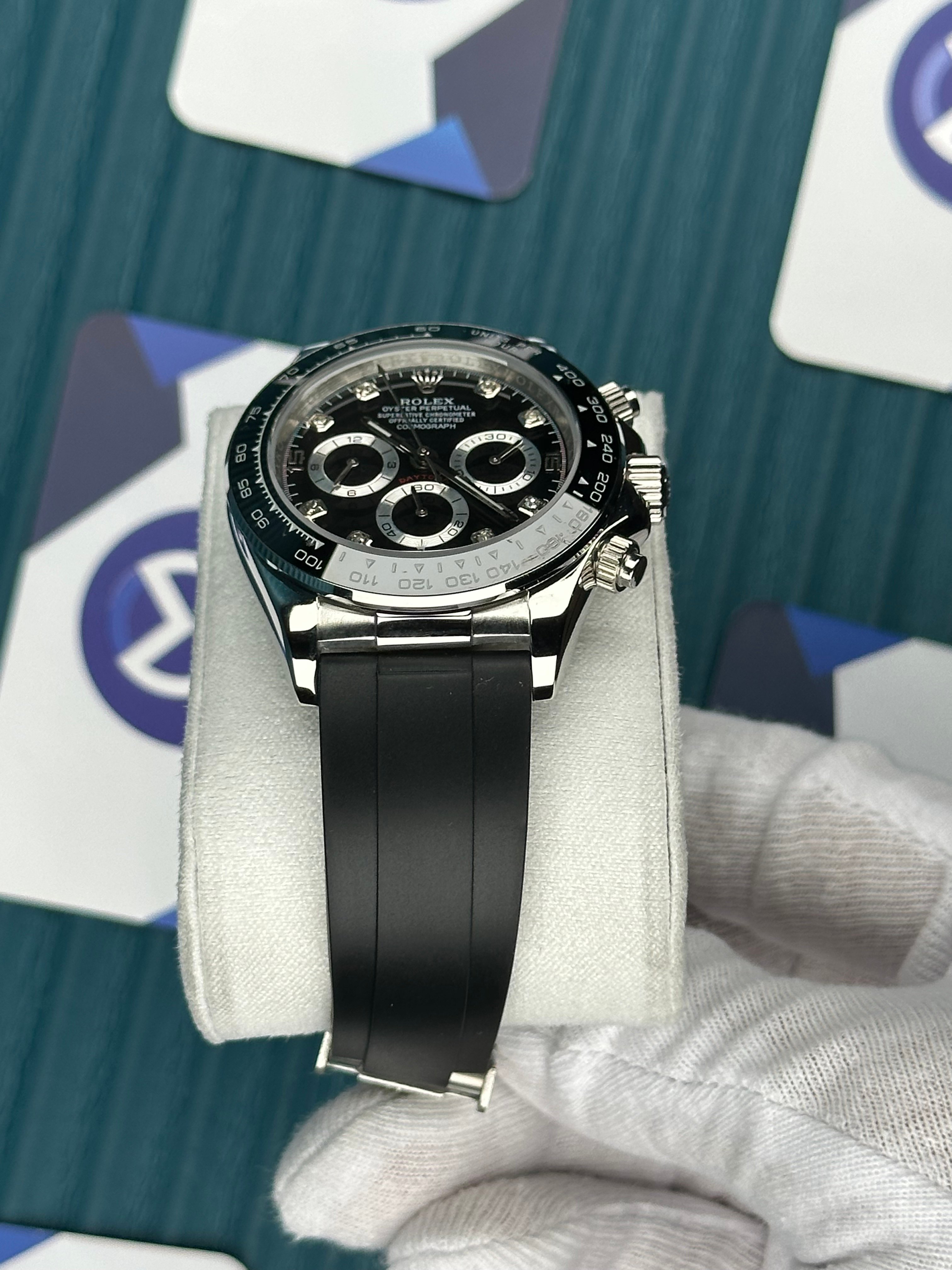 ROLEX DAYTONA BLACK DIAL DIAMOND INDEX SILVER CASE OYSTERFLEX