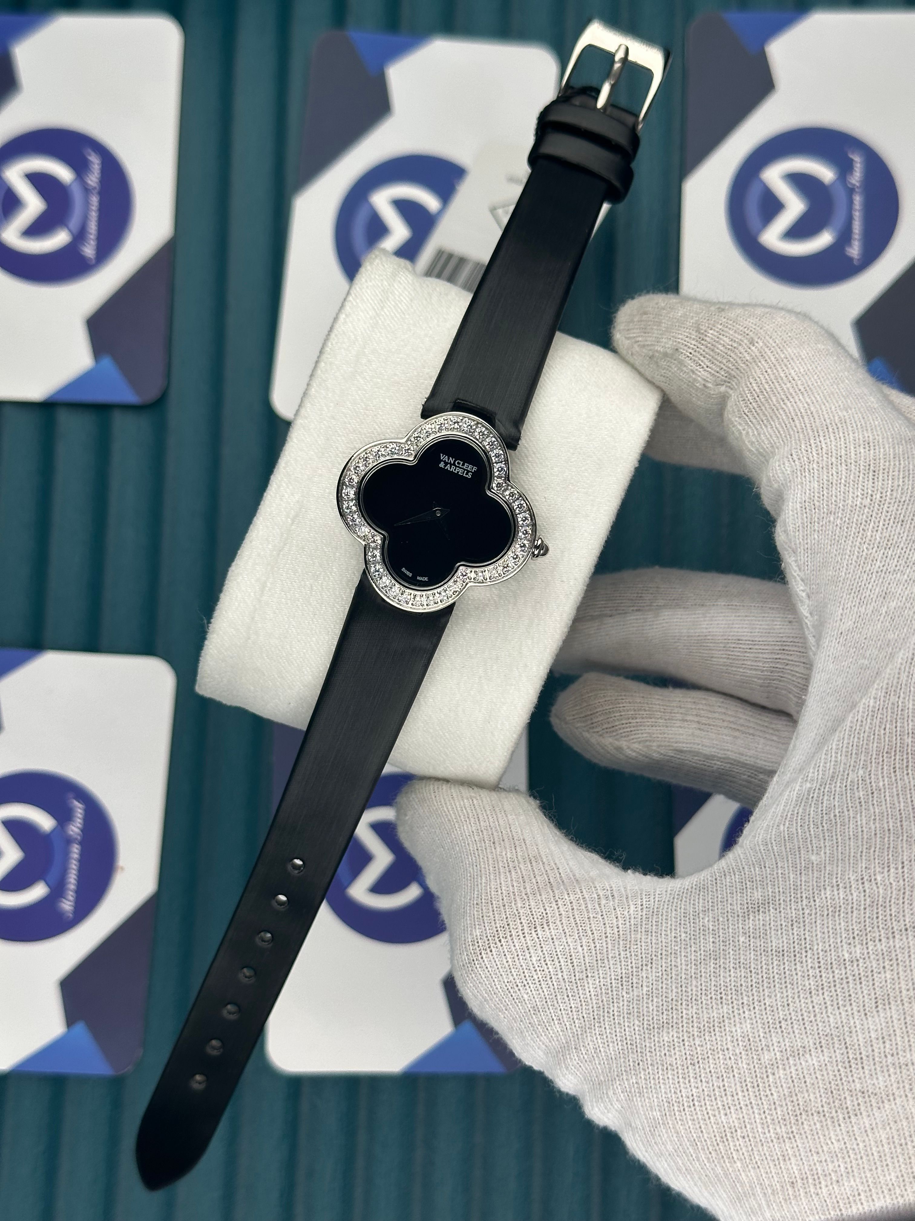 VAN CLEEF & ARPELS BLACK DIAL DIAMOND BEZEL SILVER CASE BLACK LEATHER CORD