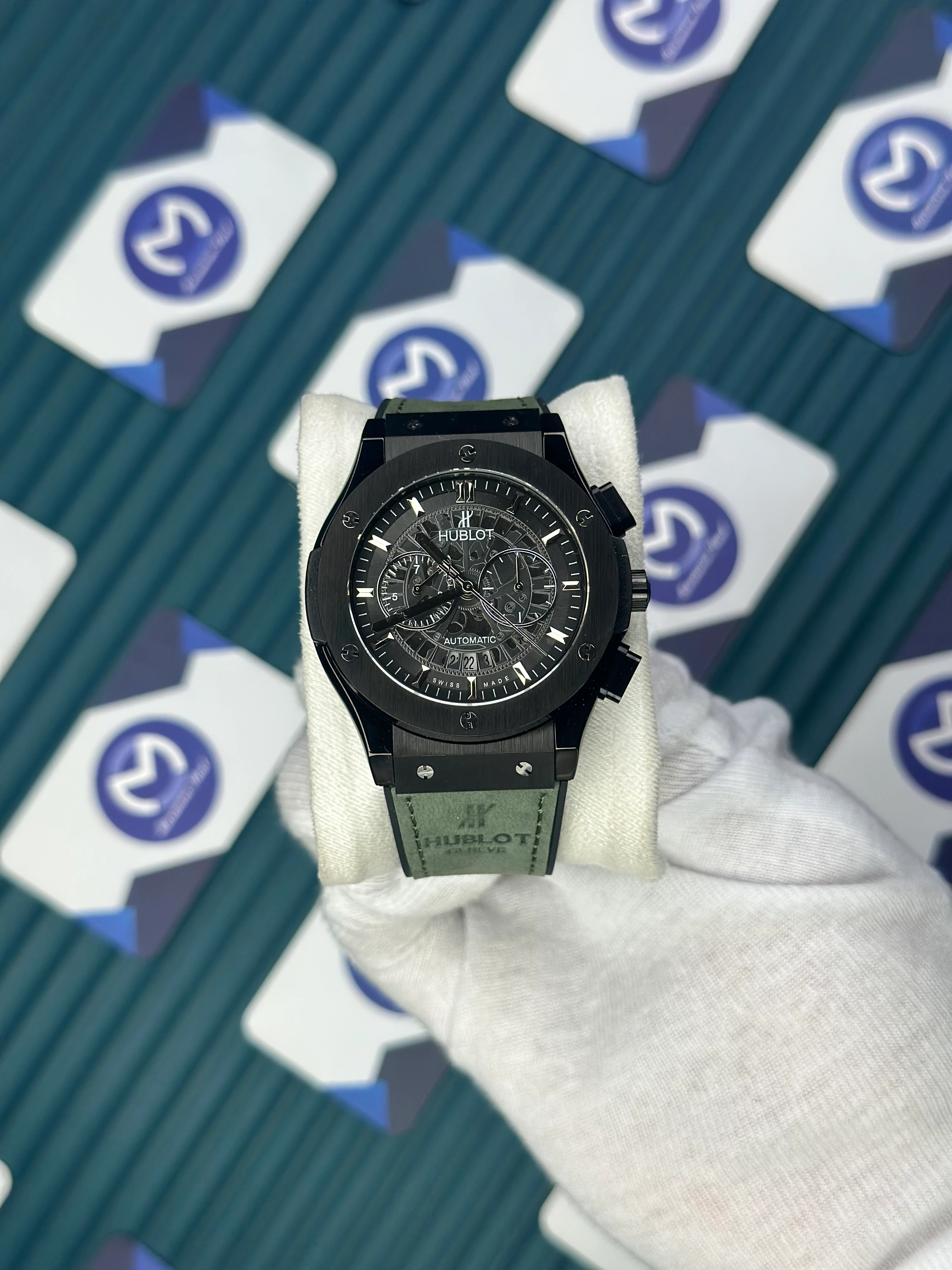 HUBLOT AUTOMATIC SKELETON DIAL BLACK CASE GREEN LEATHER CORD 