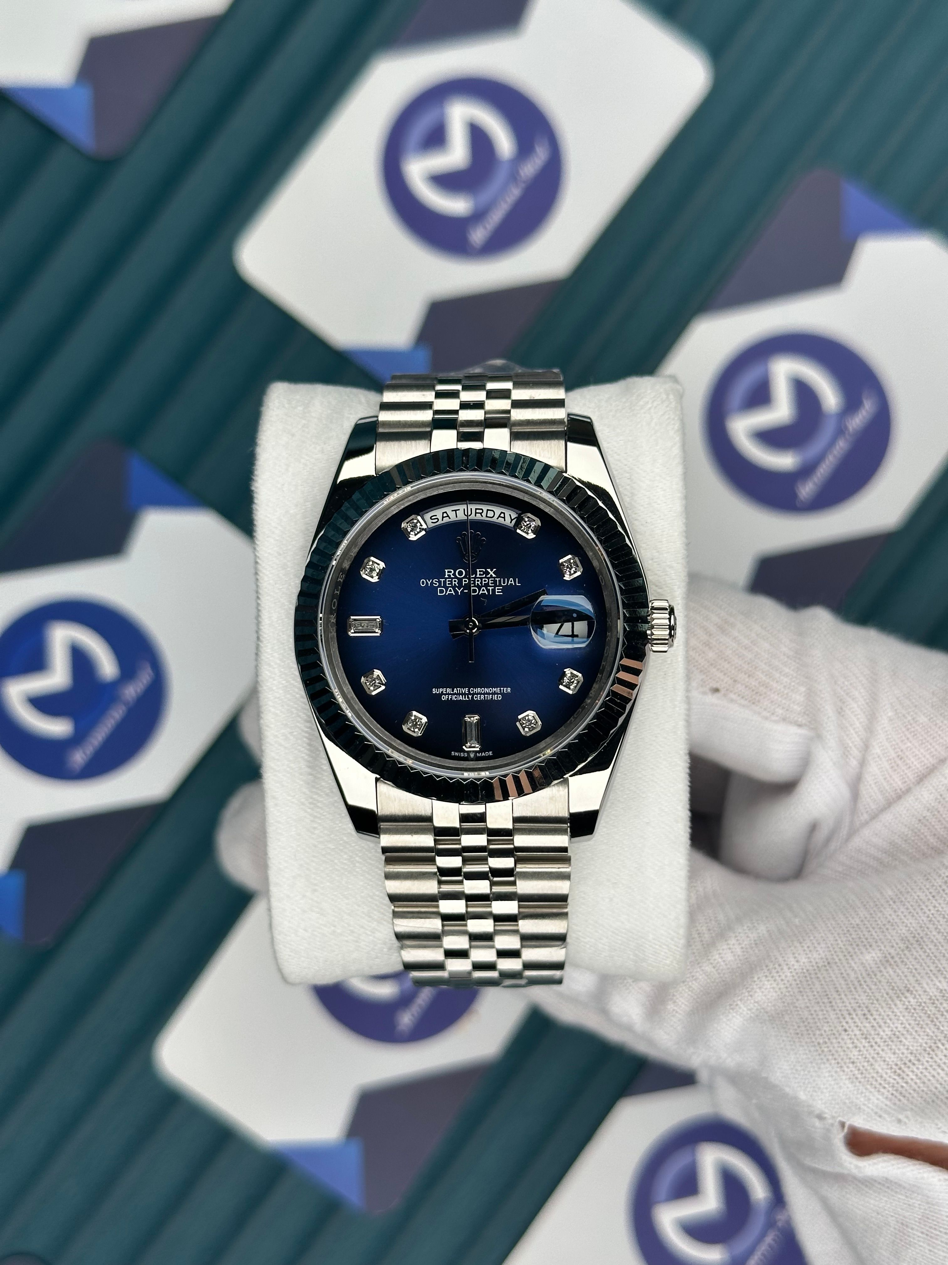 ROLEX DAY-DATE BLUE DIAL DIAMOND INDEX SILVER JUBILE