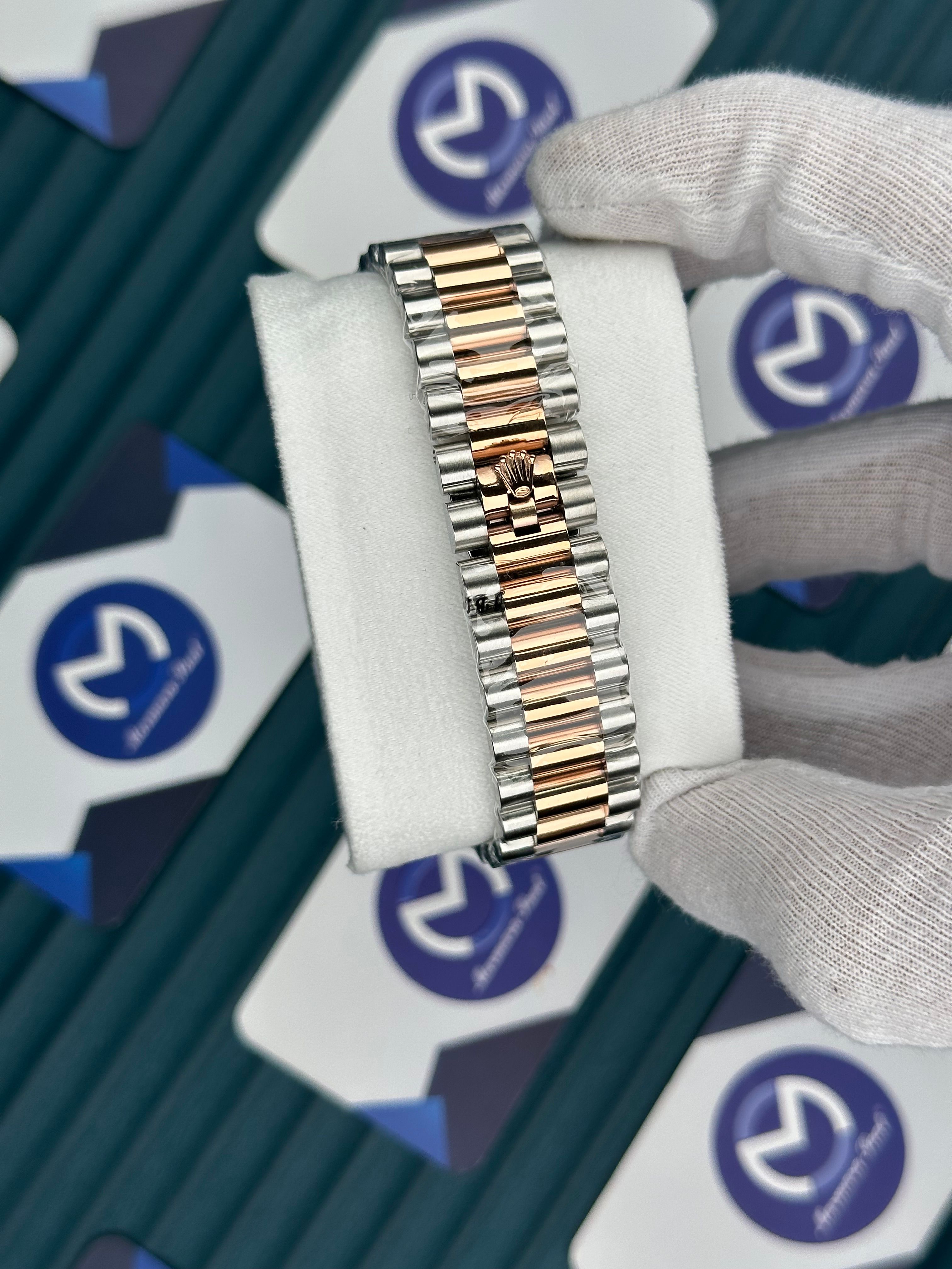 ROLEX DAY-DATE CHOCOLATE OVAL BEZEL ROSE-SILVER PRESIDENT