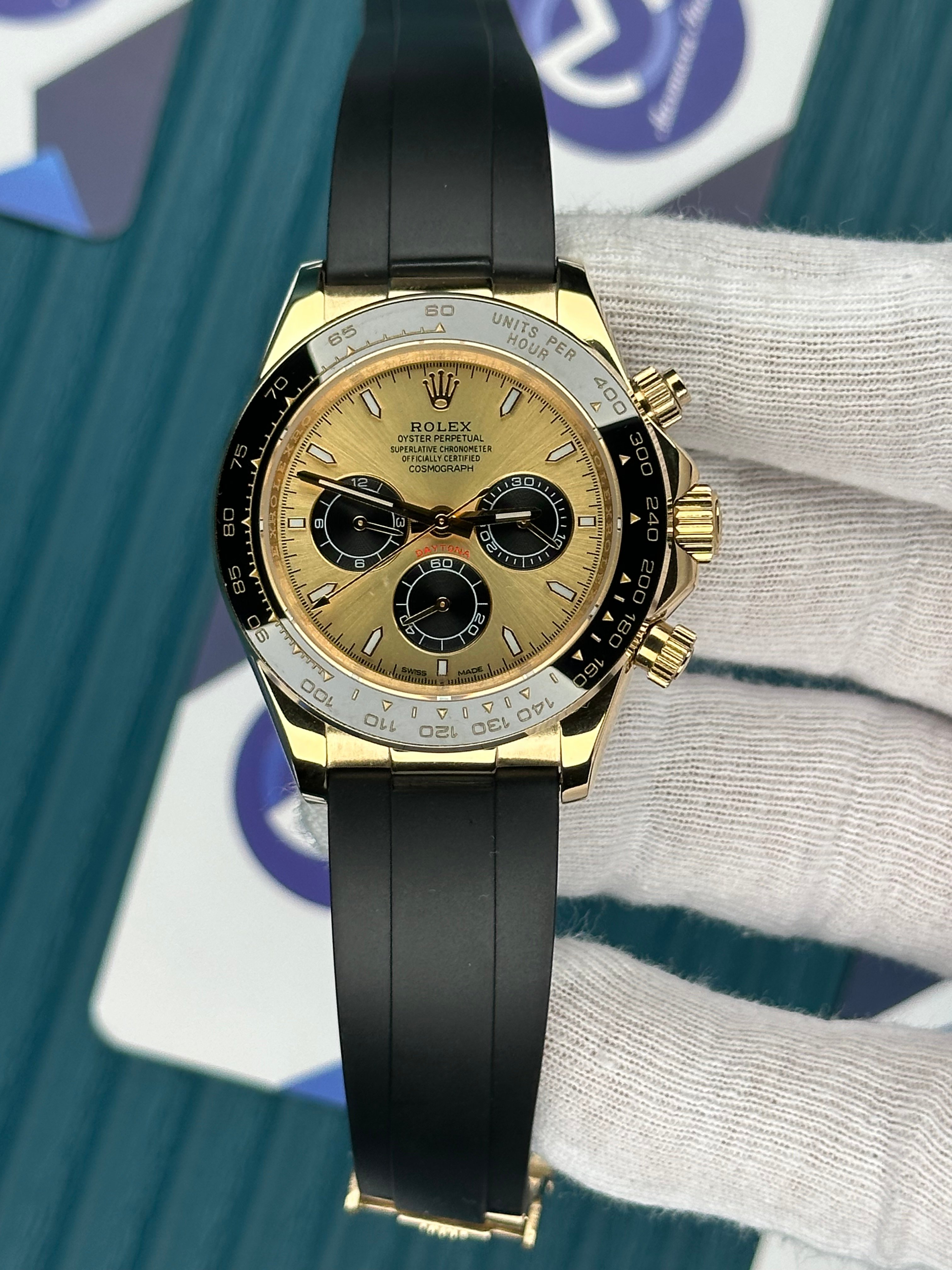ROLEX DAYTONA CHAMPAGNE DIAL GOLD CASE OYSTERFLEX