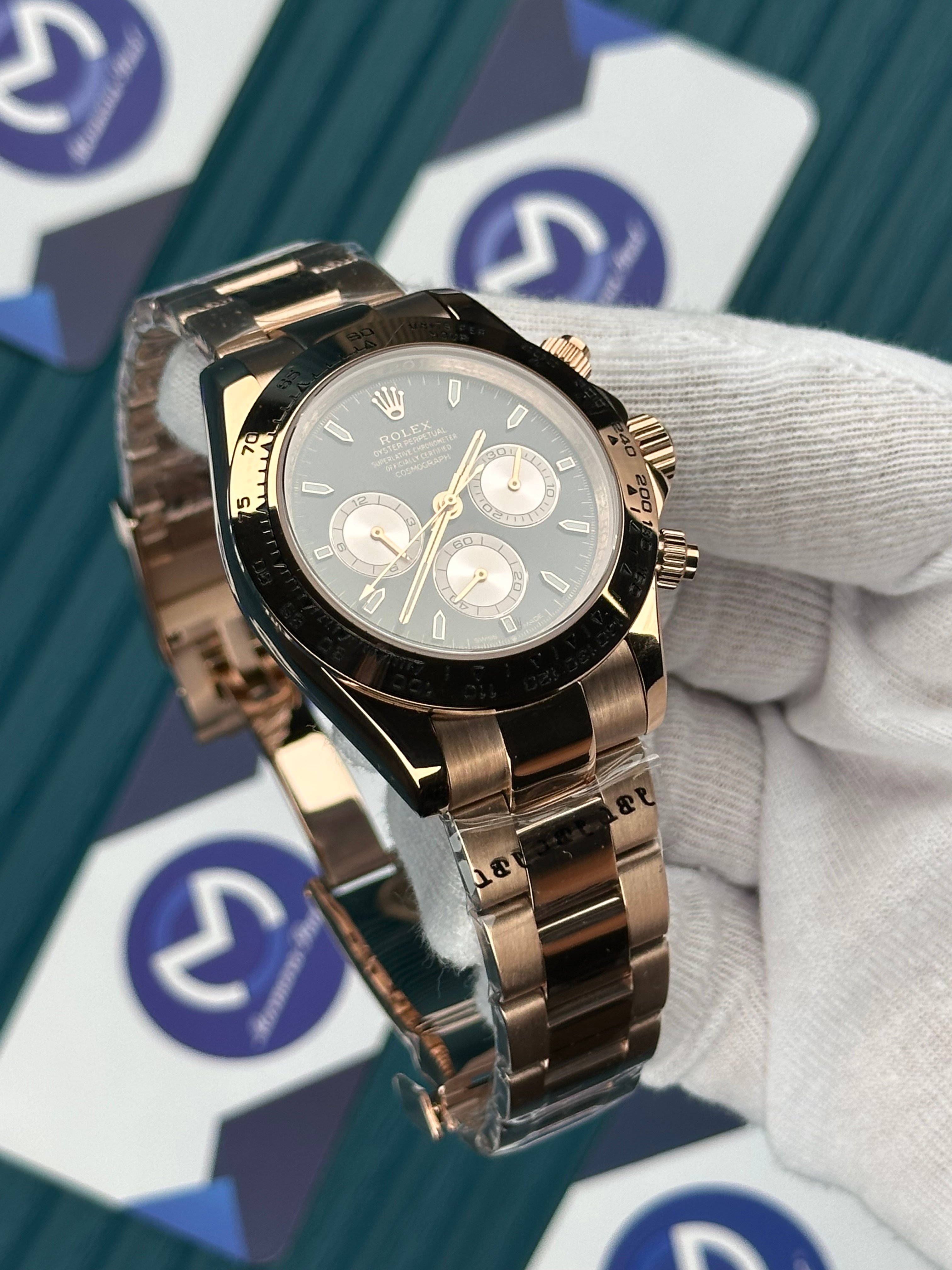 ROLEX DAYTONA BLACK DIAL ROSE OYSTER