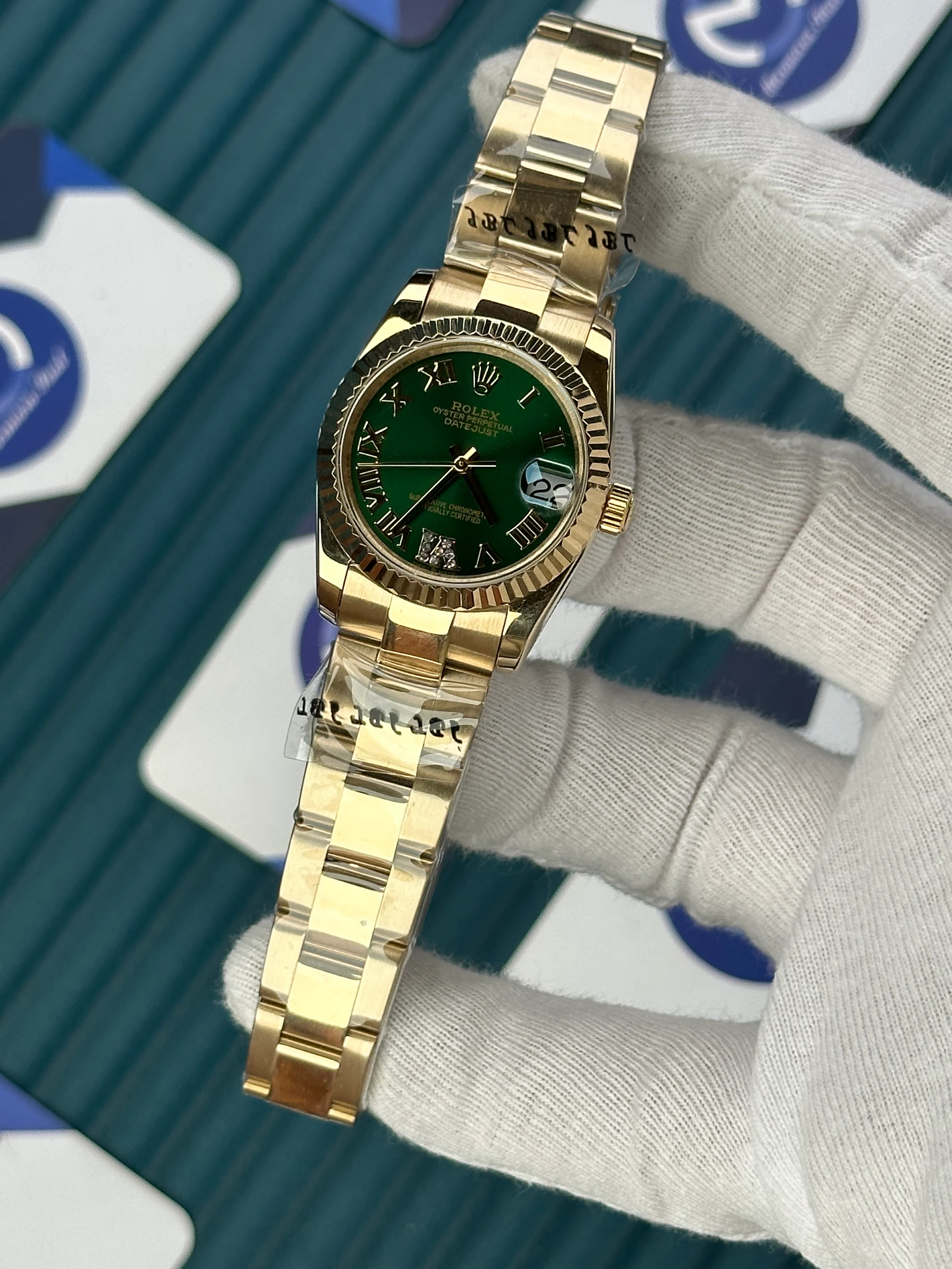 ROLEX 31 MM DATEJUST GREEN DIAL ROMA INDEX GOLD OYSTER 
