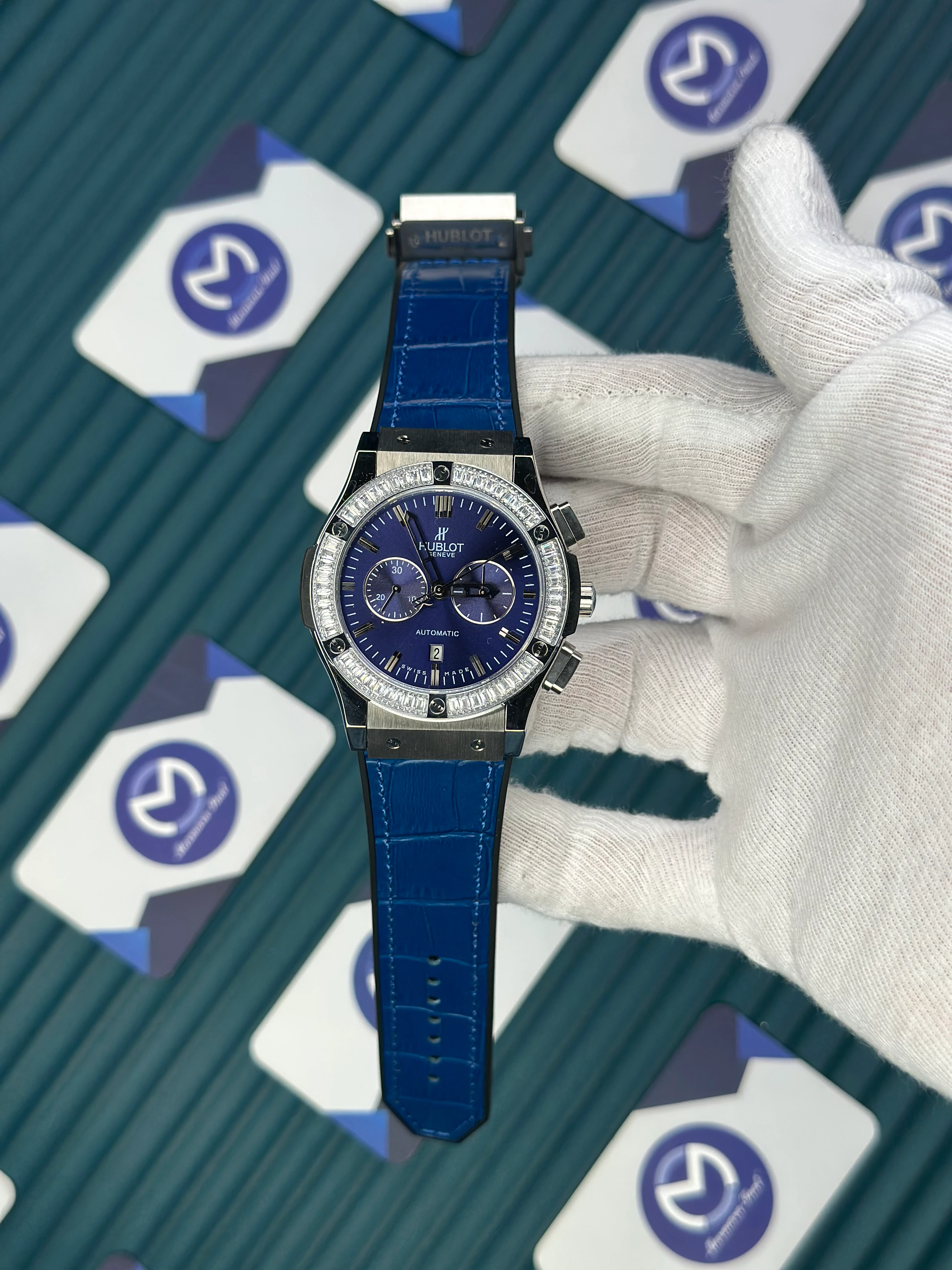 HUBLOT AUTOMATIC BLUE CHRONOGRAPH DIAL DIAMOND BEZEL SILVER CASE BLUE LEATHER CORD 
