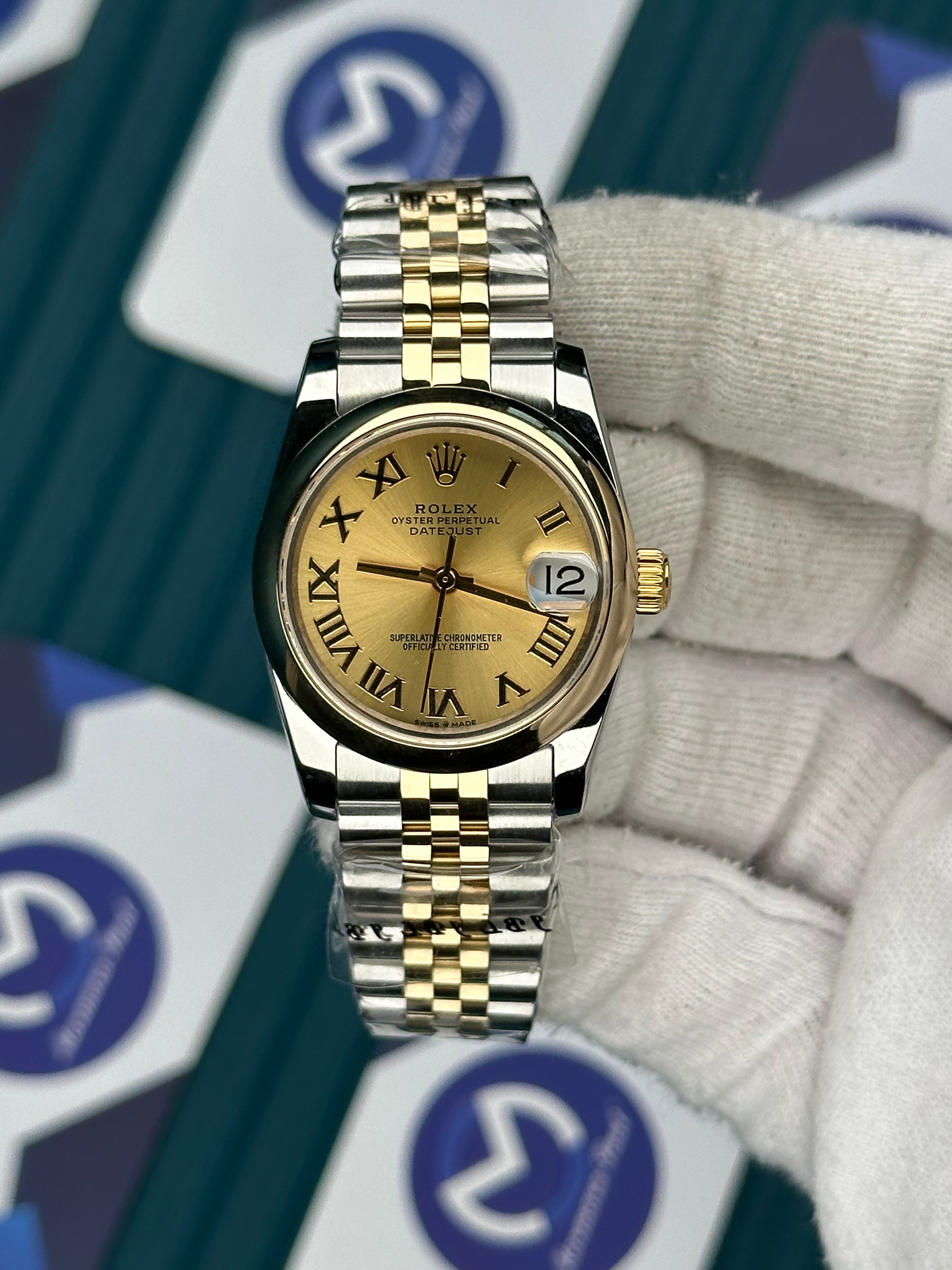 ROLEX 31 OVAL BEZEL CHAMPAGNE DIAL ROMA INDEX GOLD-SILVER JUBILEE