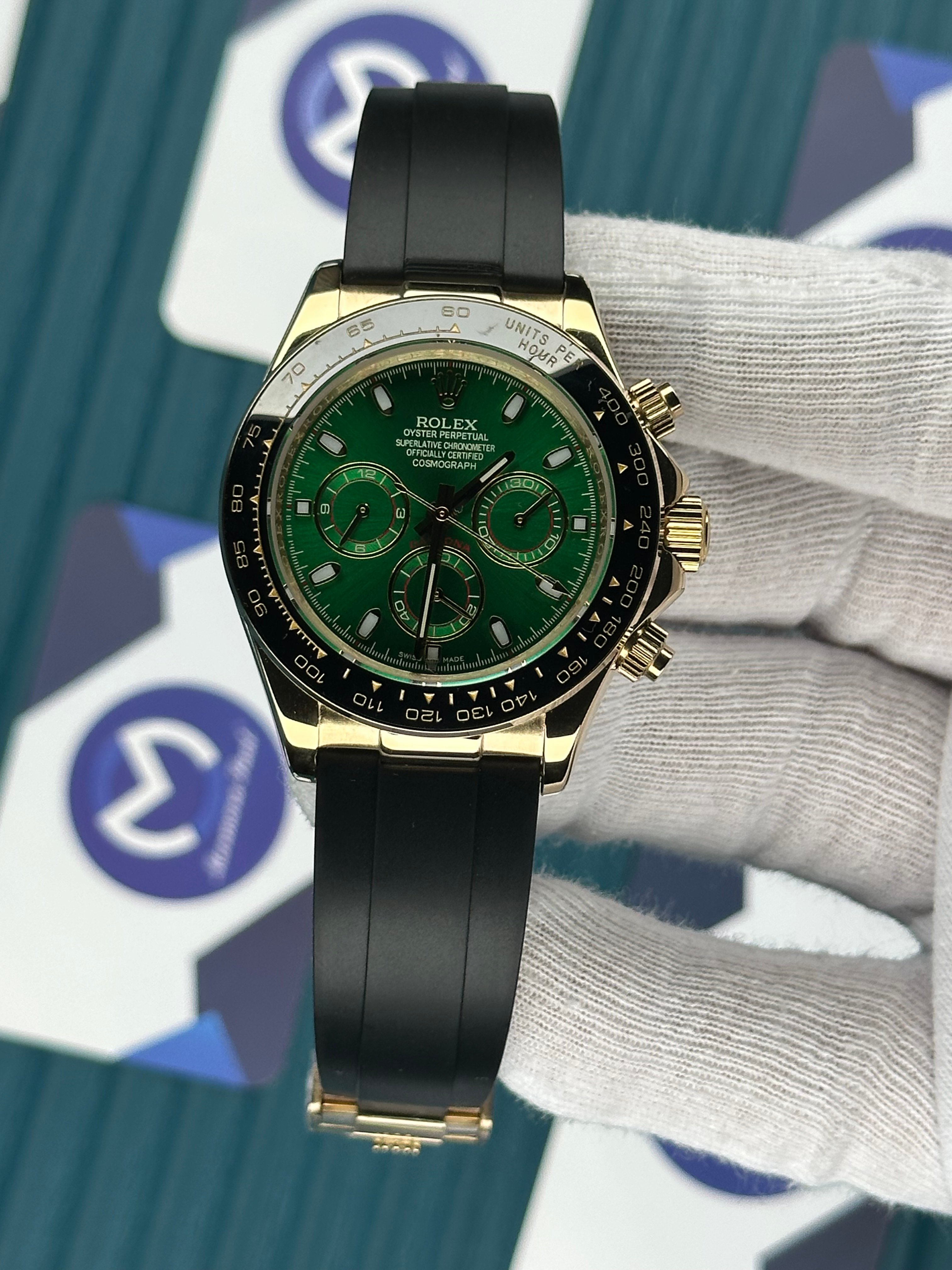 ROLEX DAYTONA GREEN DIAL GOLD CASE OYSTERFLEX