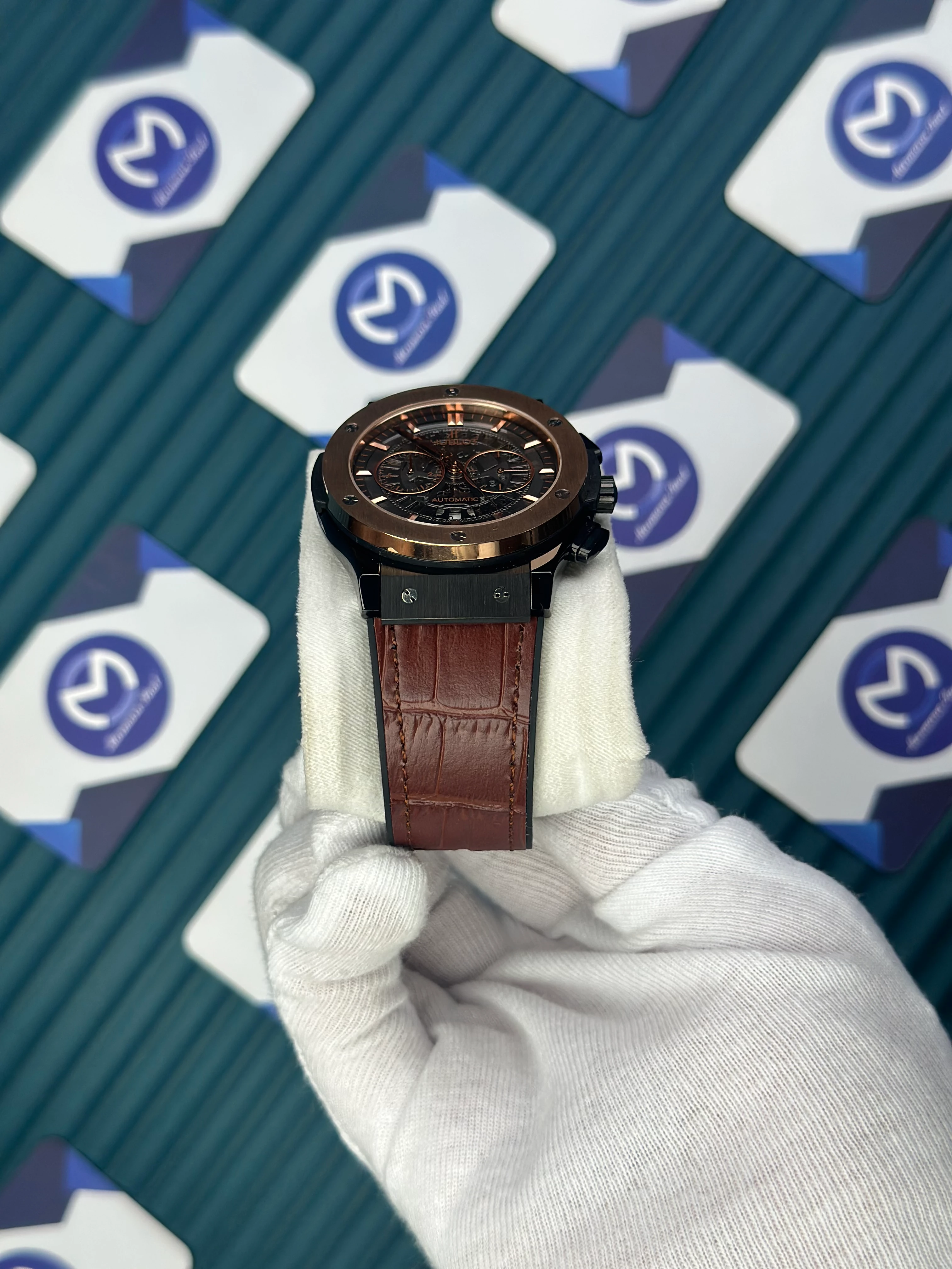 HUBLOT AUTOMATIC SKELETON DIAL ROSE BEZEL BLACK CASE BROWN LEATHER CORD 