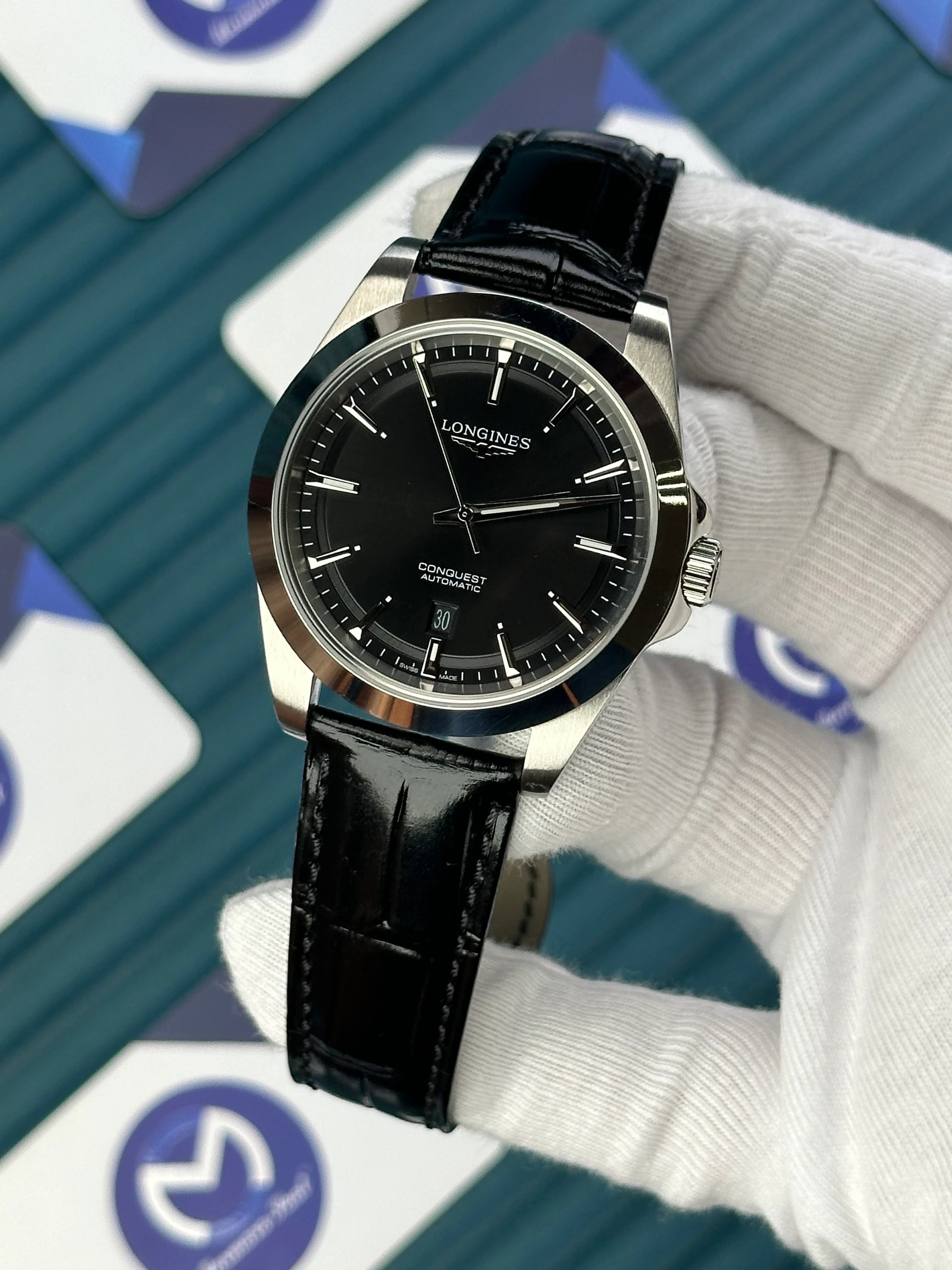 LONGINES CONQUEST AUTOMATIC BLACK DIAL SILVER CASE BLACK LEATHER 