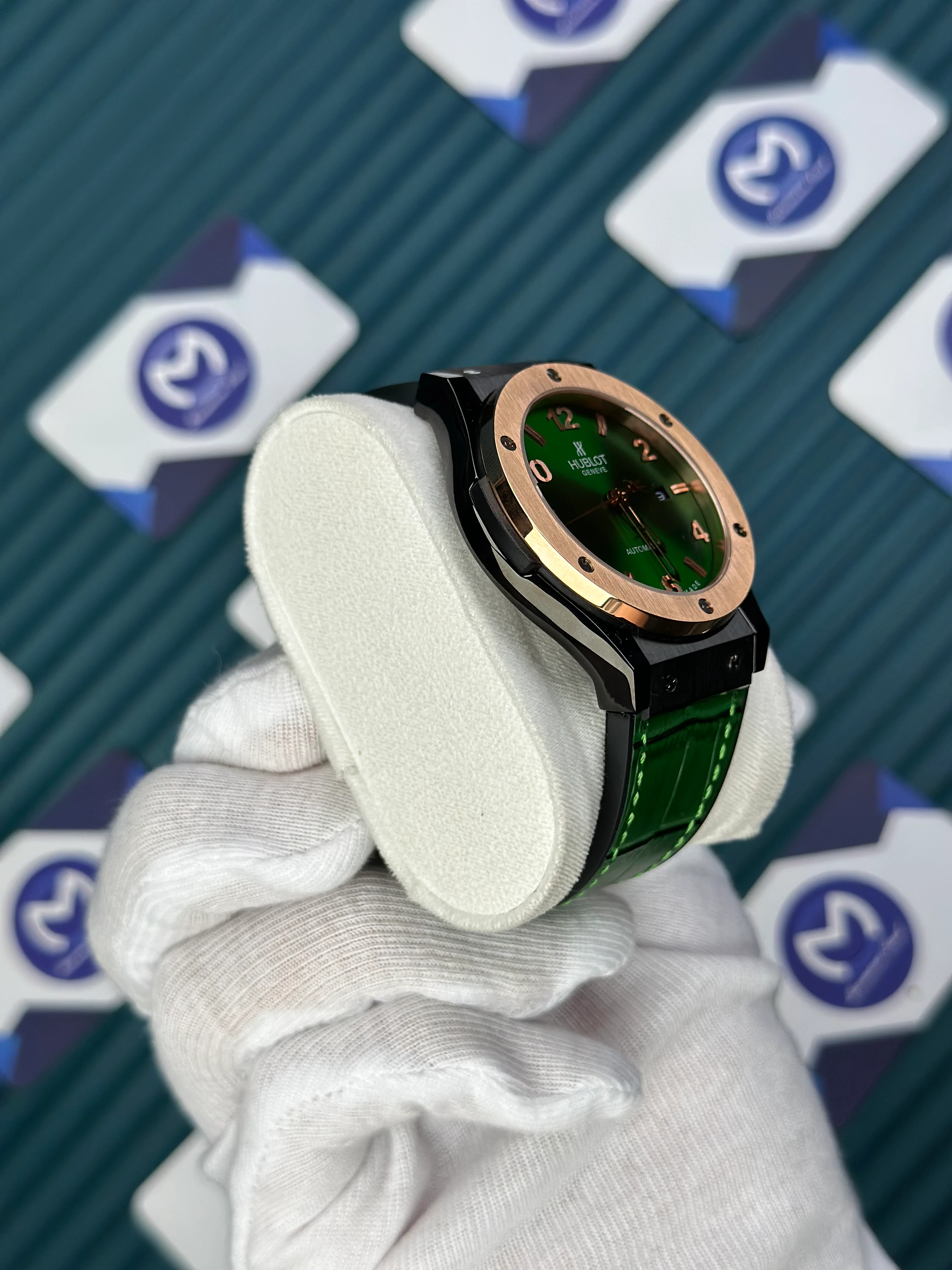 HUBLOT GENEVE AUTOMATIC GREEN DIAL ROSE BEZEL BLACK CASE GREEN LEATHER CORD