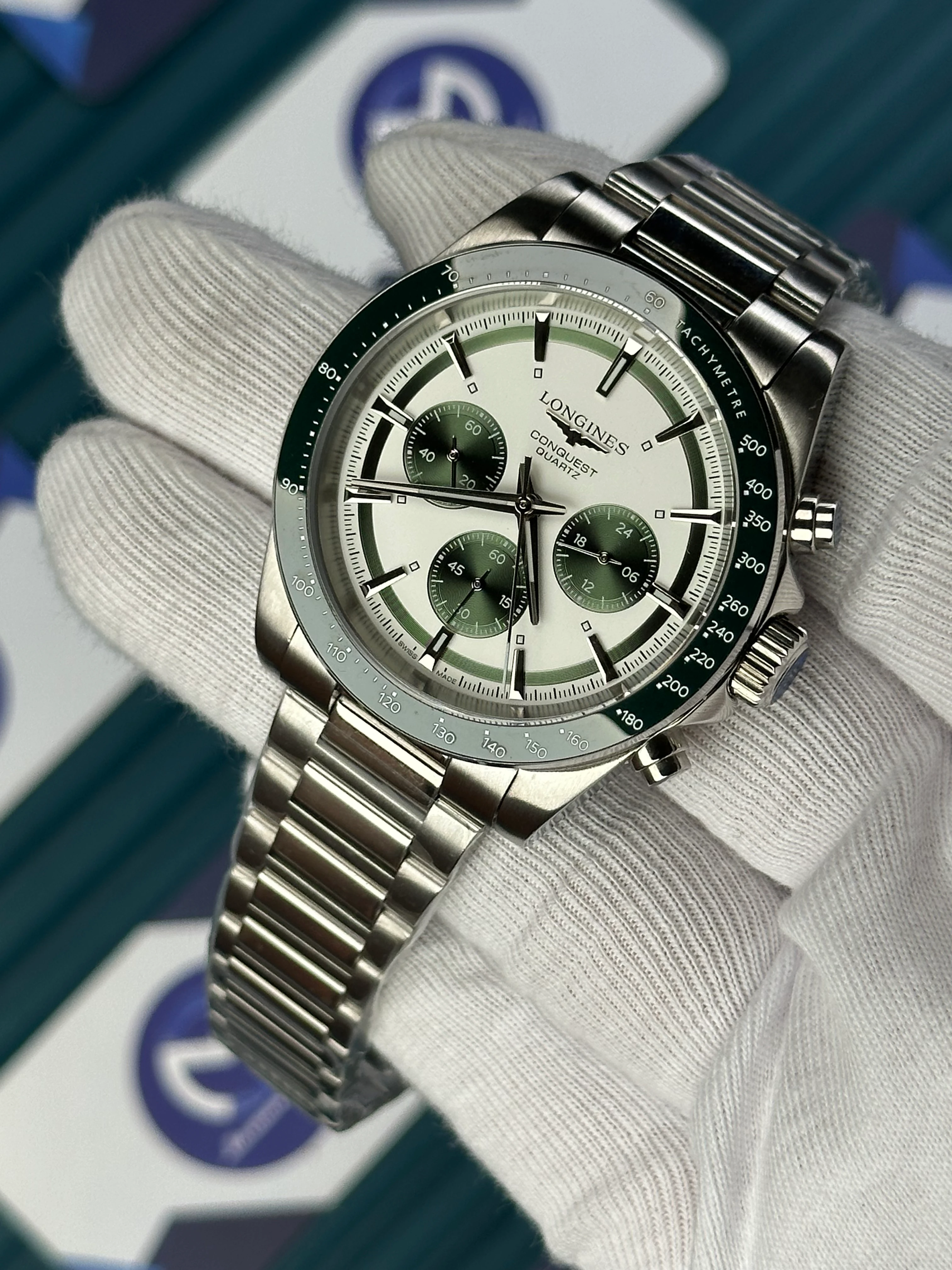 LONGINES CONQUEST CHRONOGRAPH AUTOMATIC WHITE DIAL GREEN BEZEL SILVER 