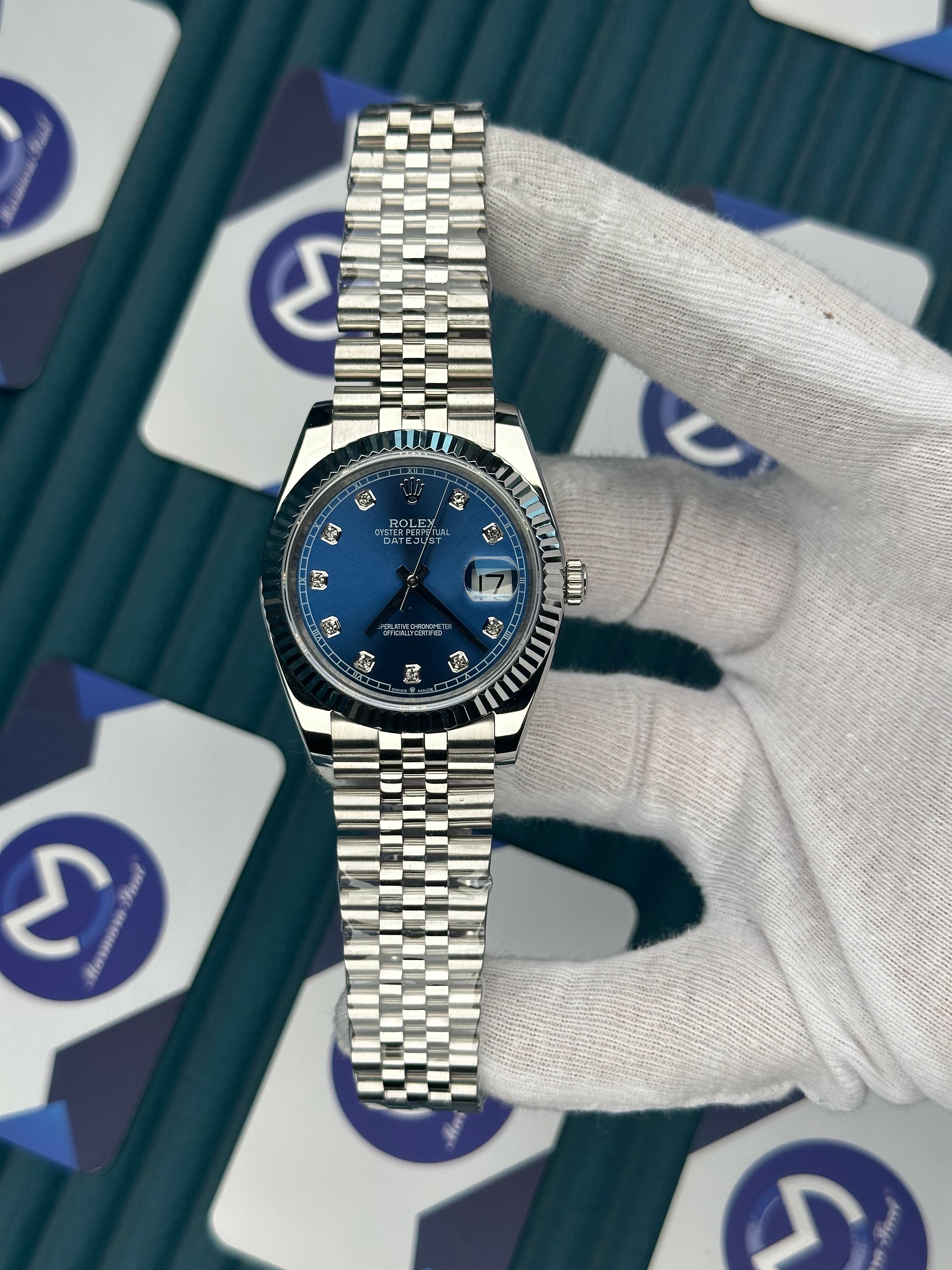 ROLEX DATEJUST BLUE DIAL DIAMOND INDEX SILVER JUBILE