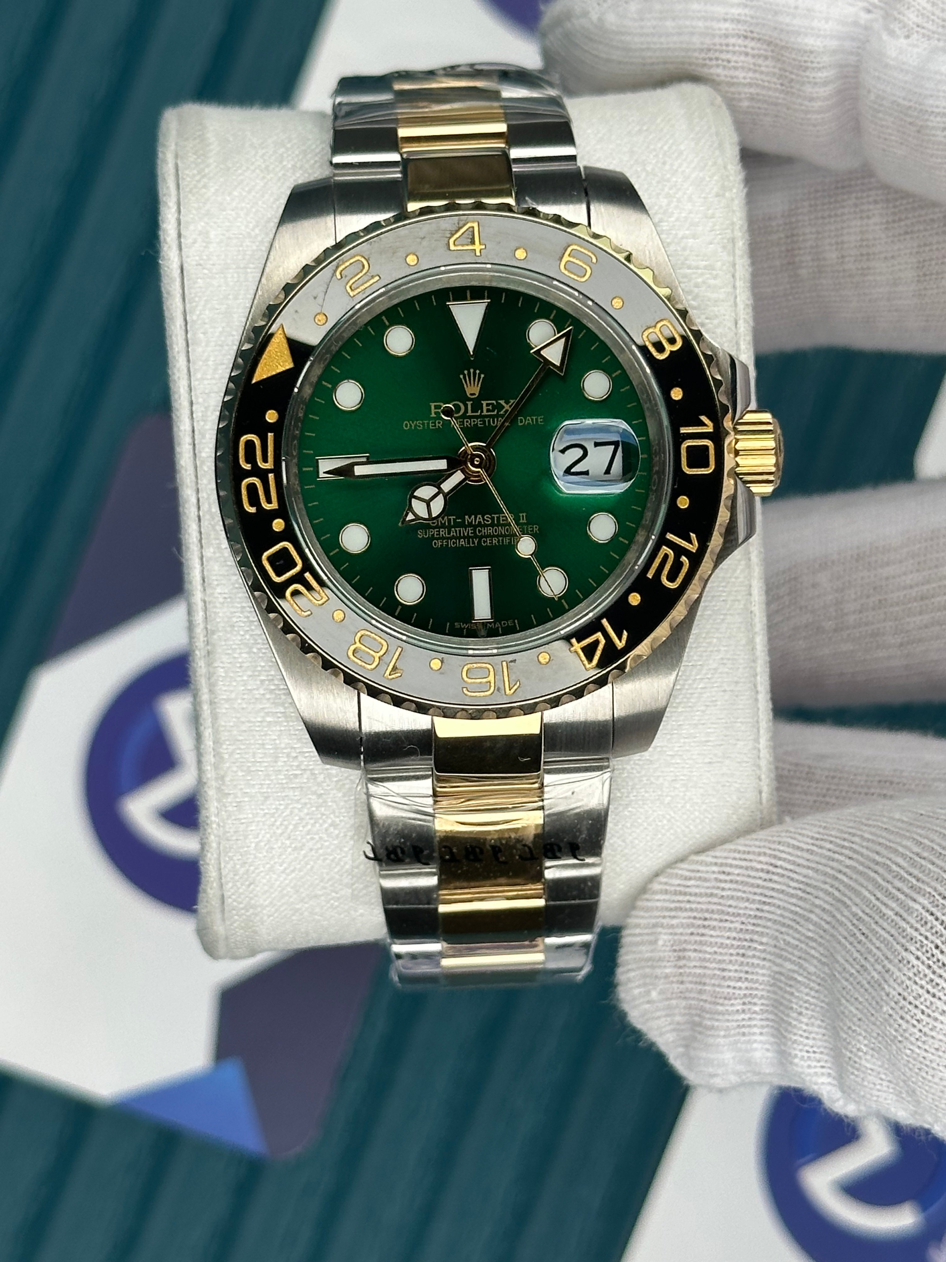 ROLEX GMT MASTER II GREEN DIAL BLACK BEZEL GOLD SILVER OYSTER