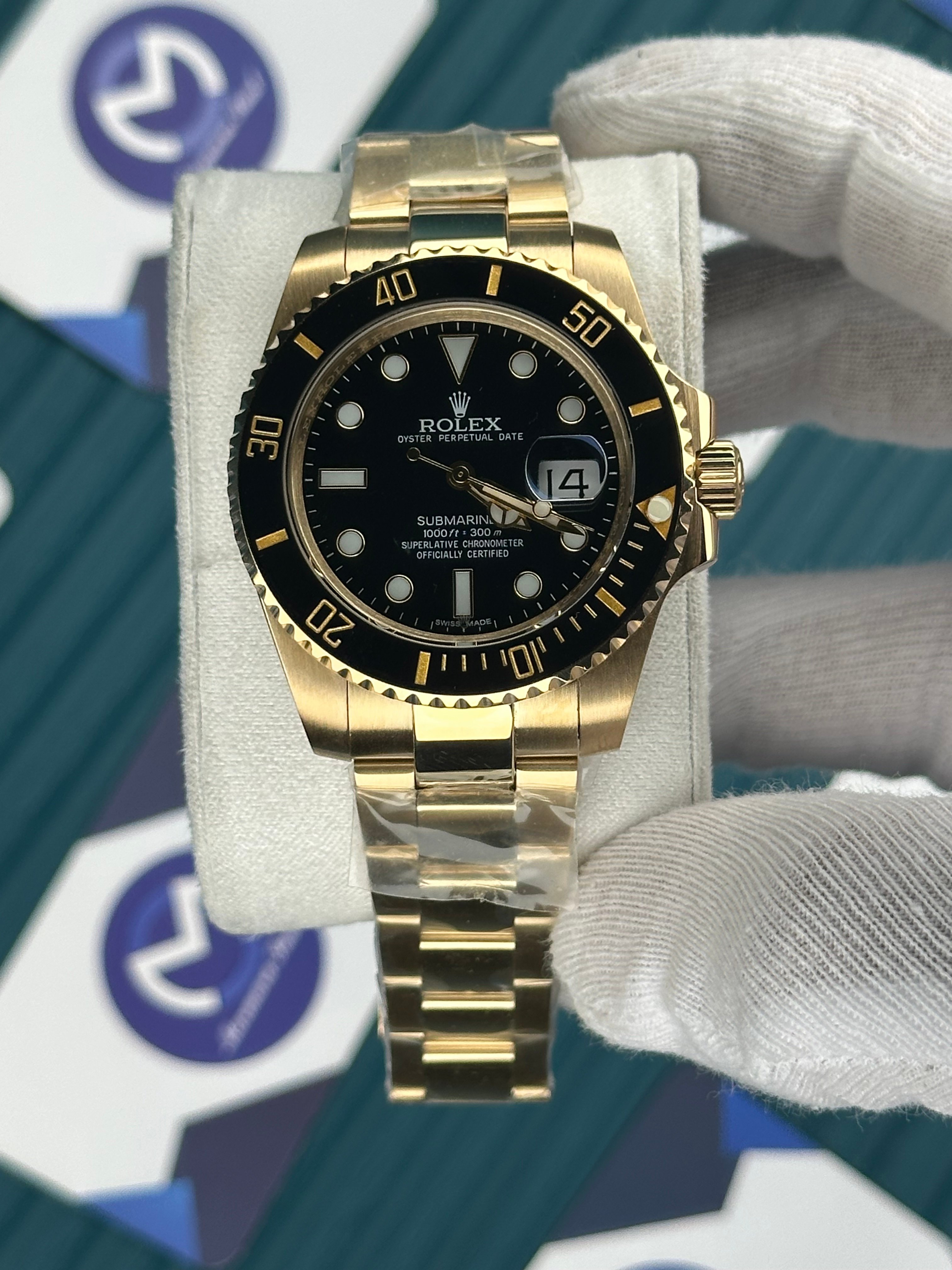 ROLEX SUBMARINER NLACK DIAL GOLD OYSTER