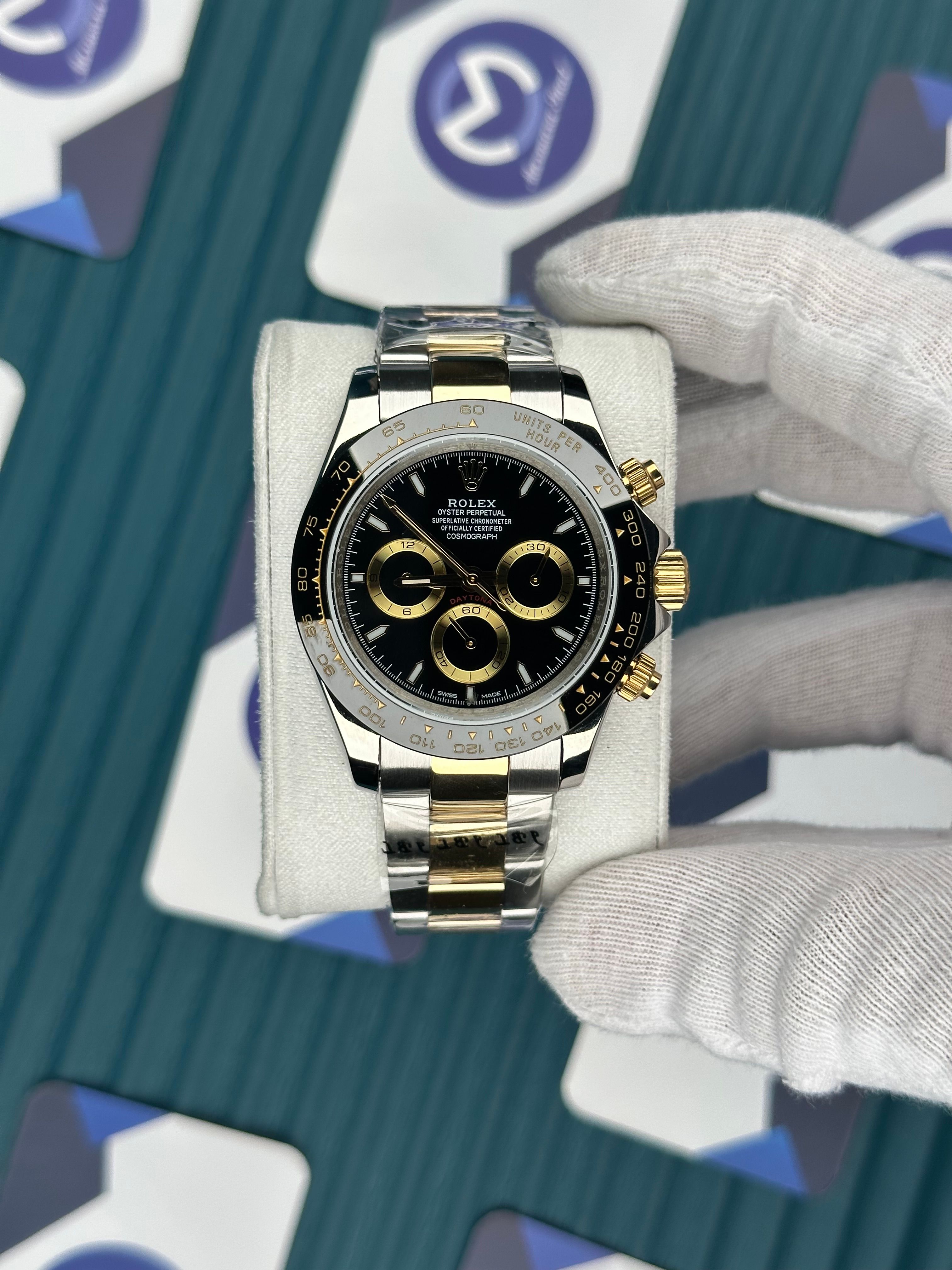 ROLEX DAYTONA BLACK DIAL GOLD-SILVER OYSTER