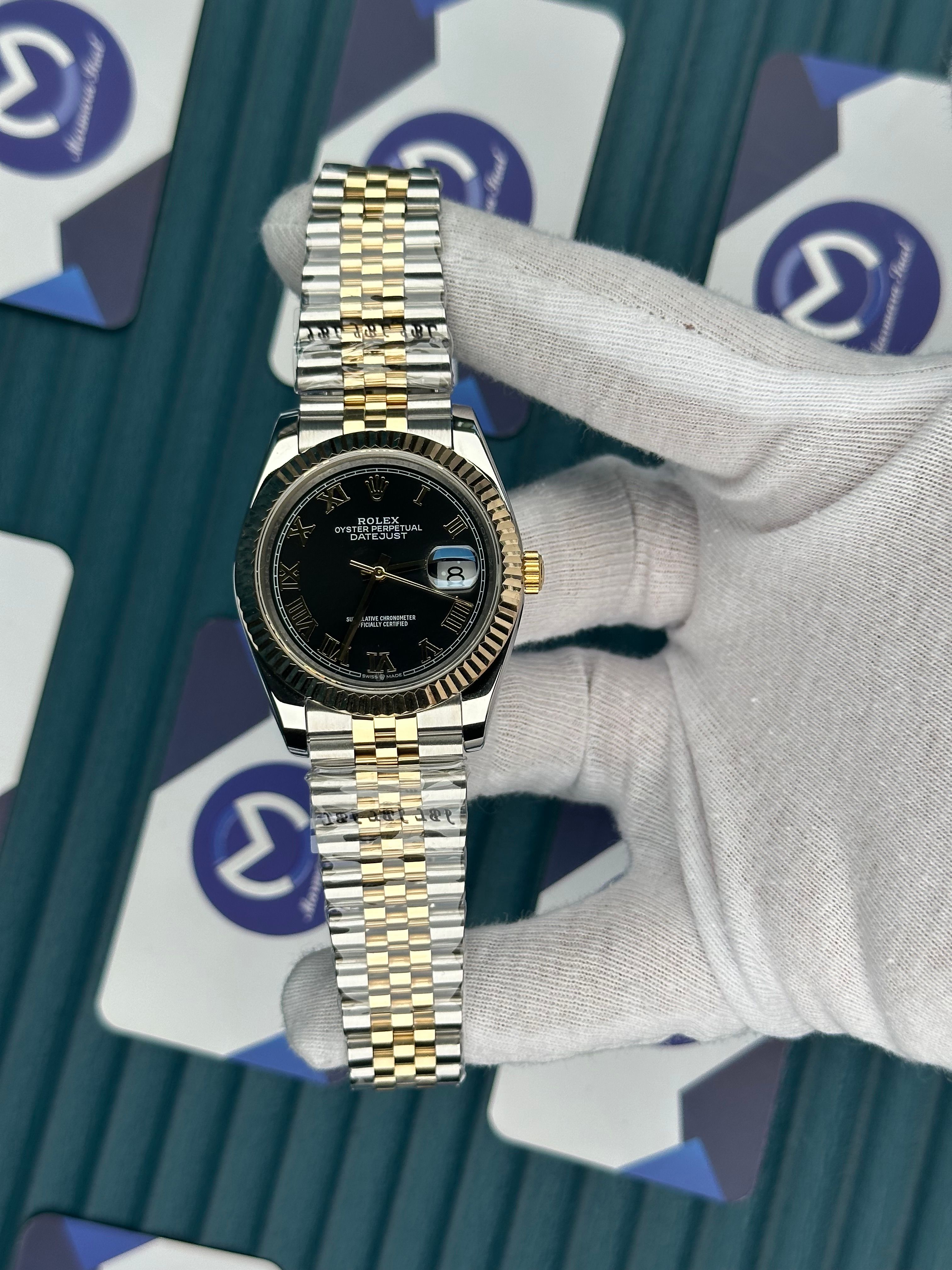 ROLEX DATEJUST GOLD ROMA INDEX BLACK DIAL GOLD-SILVER JUBILE