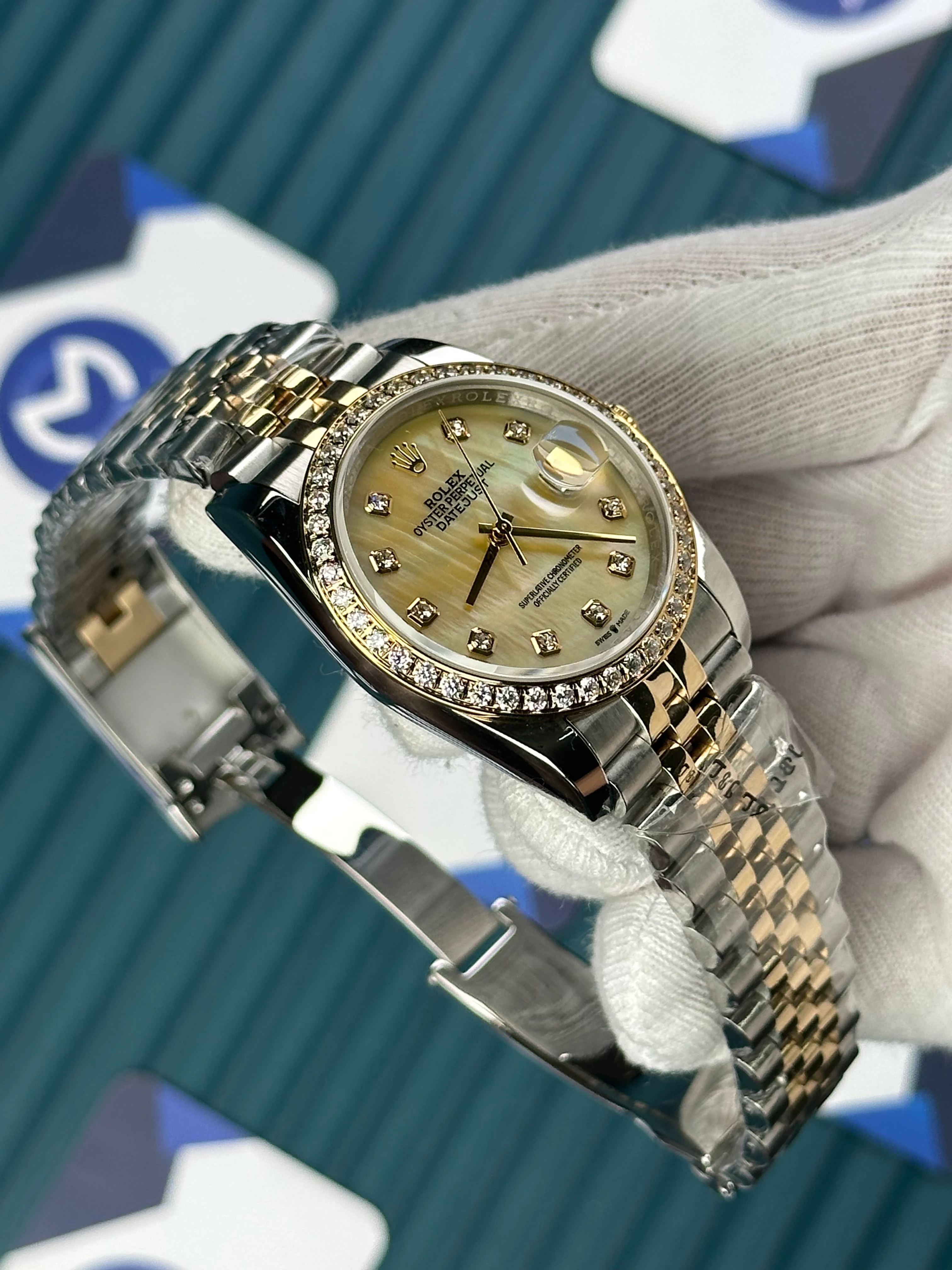 ROLEX 36 MM DATEJUST CHAMPAGNE DIAL DIAMOND INDEX AND BEZEL GOLD-SILVER JUBILE 