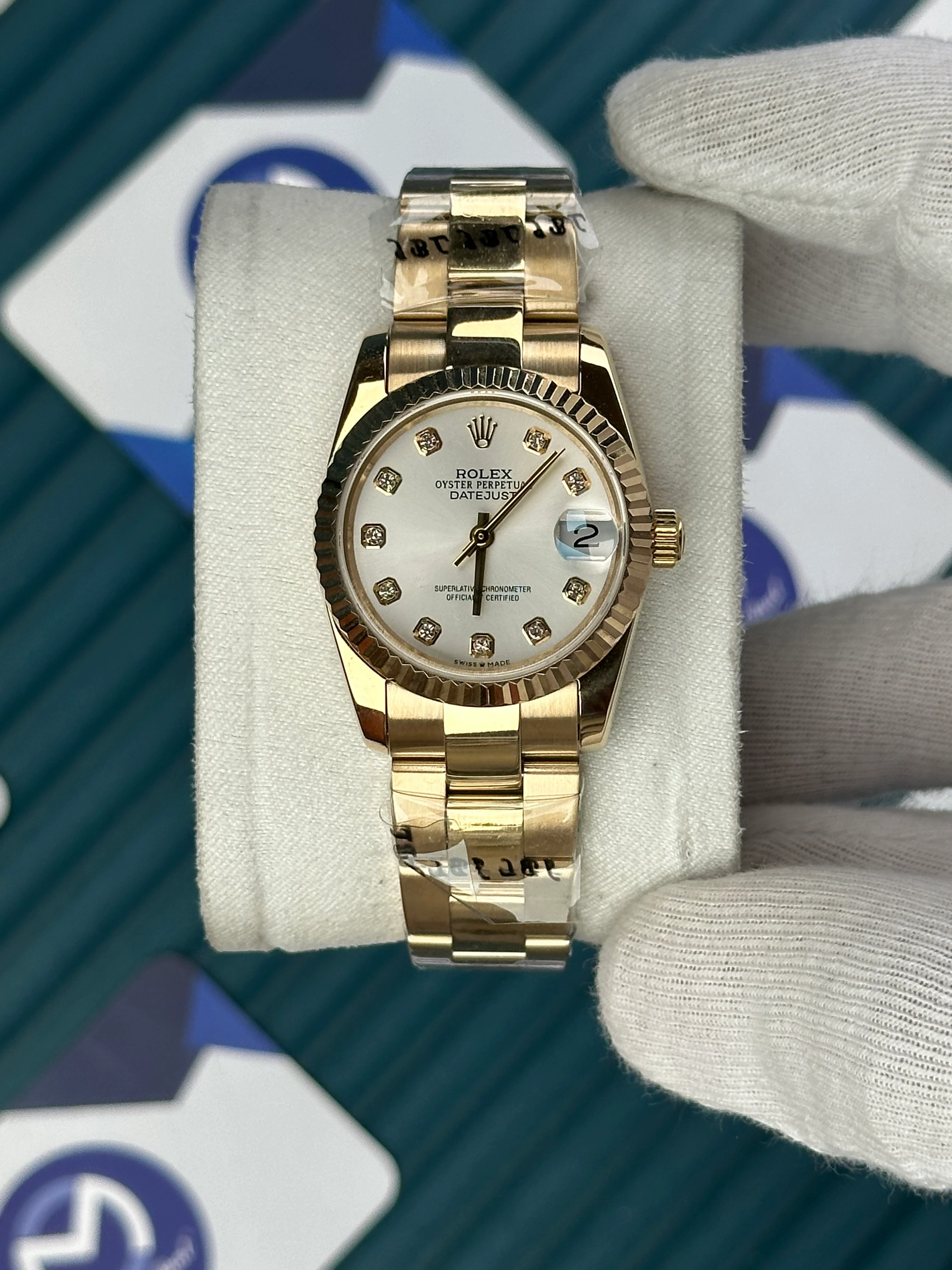 ROLEX 31 MM DATEJUST WHITE DIAL DIAMOND INDEX GOLD OYSTER 