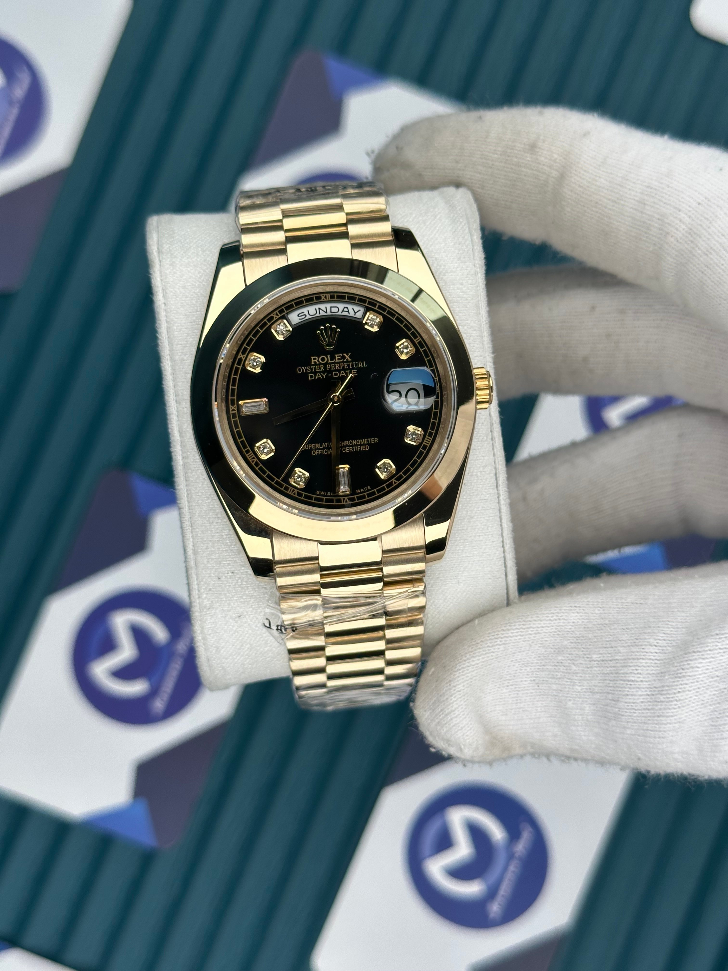 ROLEX DAY-DATE BLACK DIAL OVAL BEZEL DIAMOND INDEX GOLD PRESIDENT
