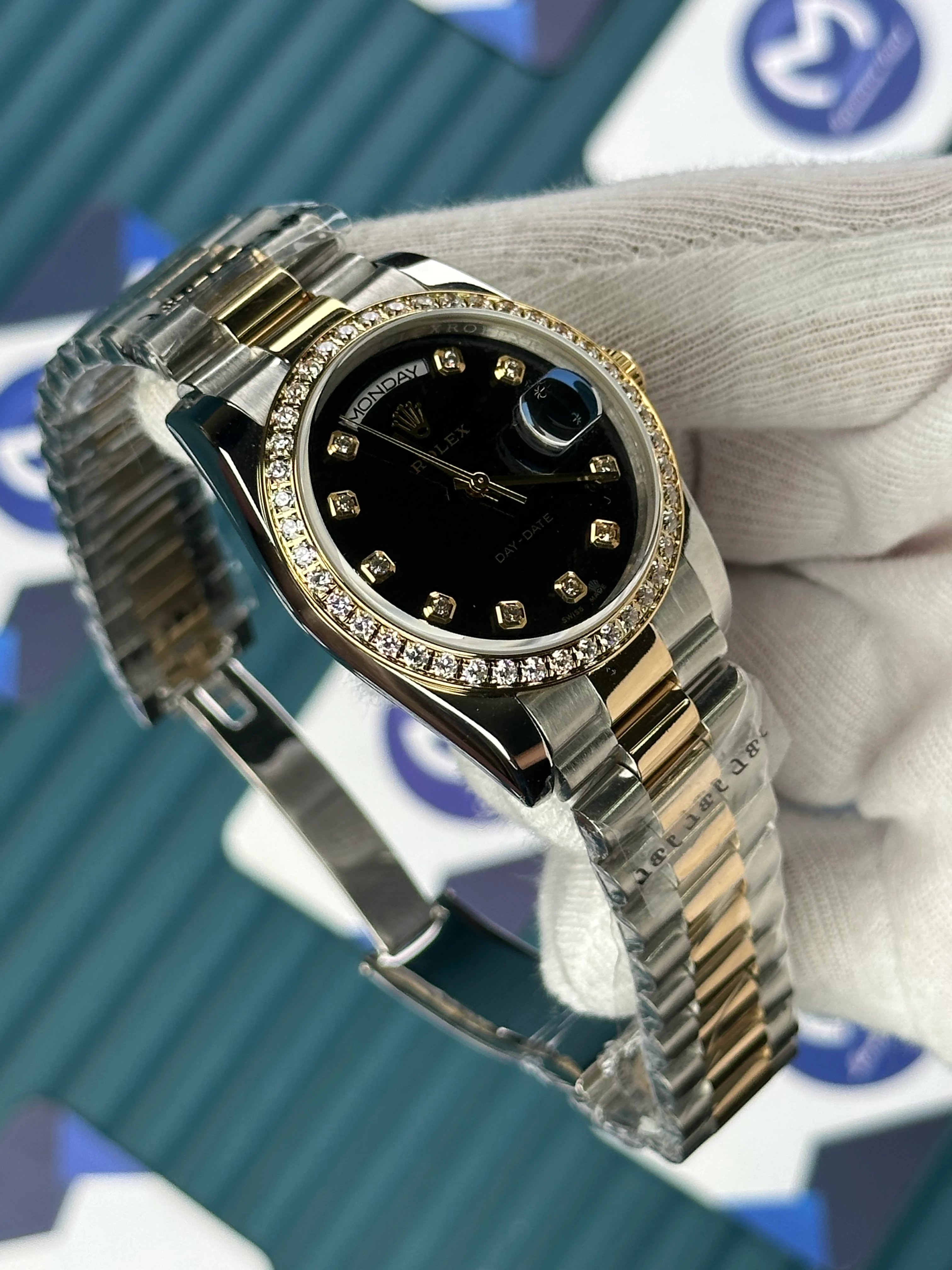 ROLEX 36 MM DAY-DATE BLACK PATTERNED DIAL DIAMOND INDEX AND BEZEL GOLD-SILVER PREIDENT 