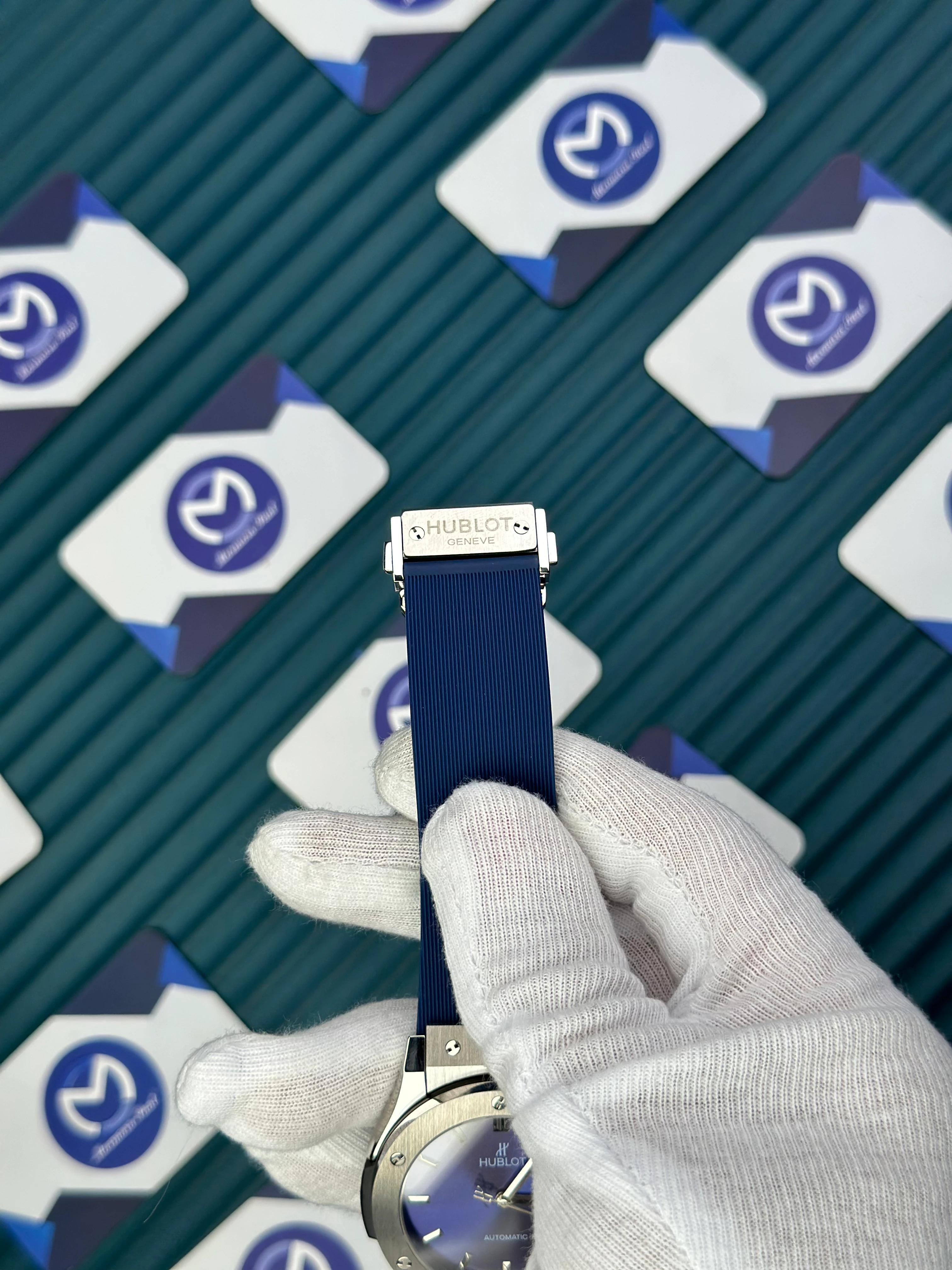 HUBLOT GENEVE AUTOMATIC BLUE DIAL SILVER CASE BLUE RUBBER CORD 