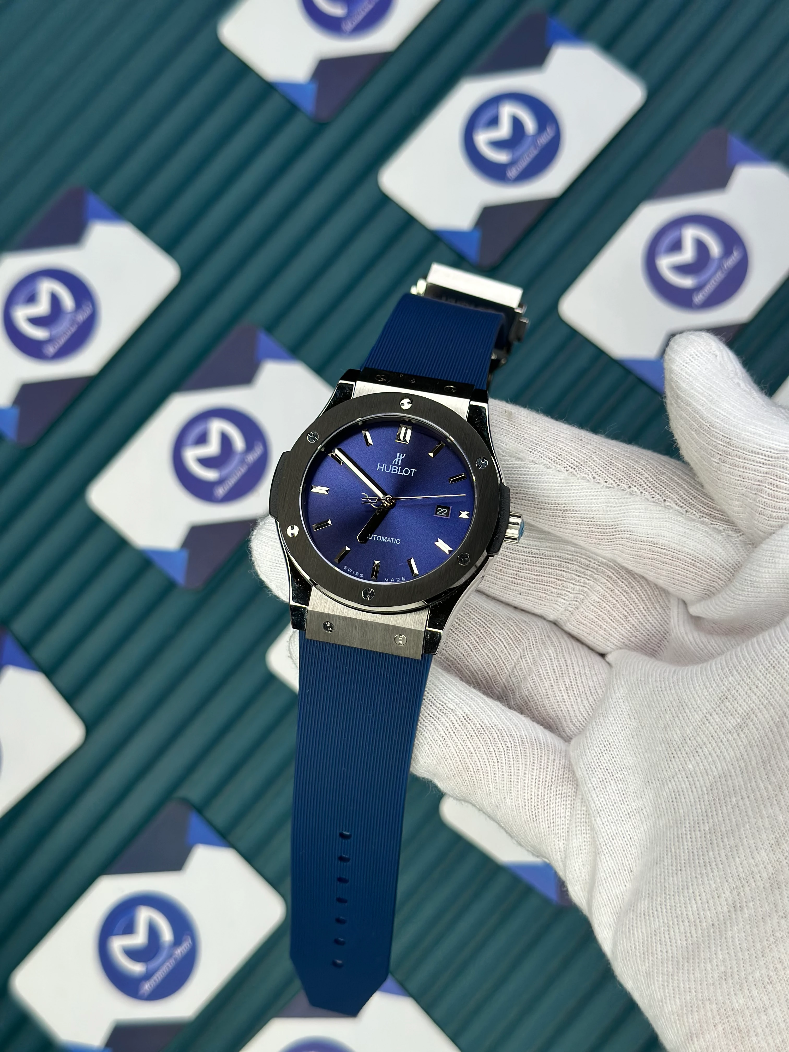 HUBLOT GENEVE AUTOMATIC VENDOME BLUE DIAL SILVER CASE BLACK BEZEL BLUE RUBBER CORD