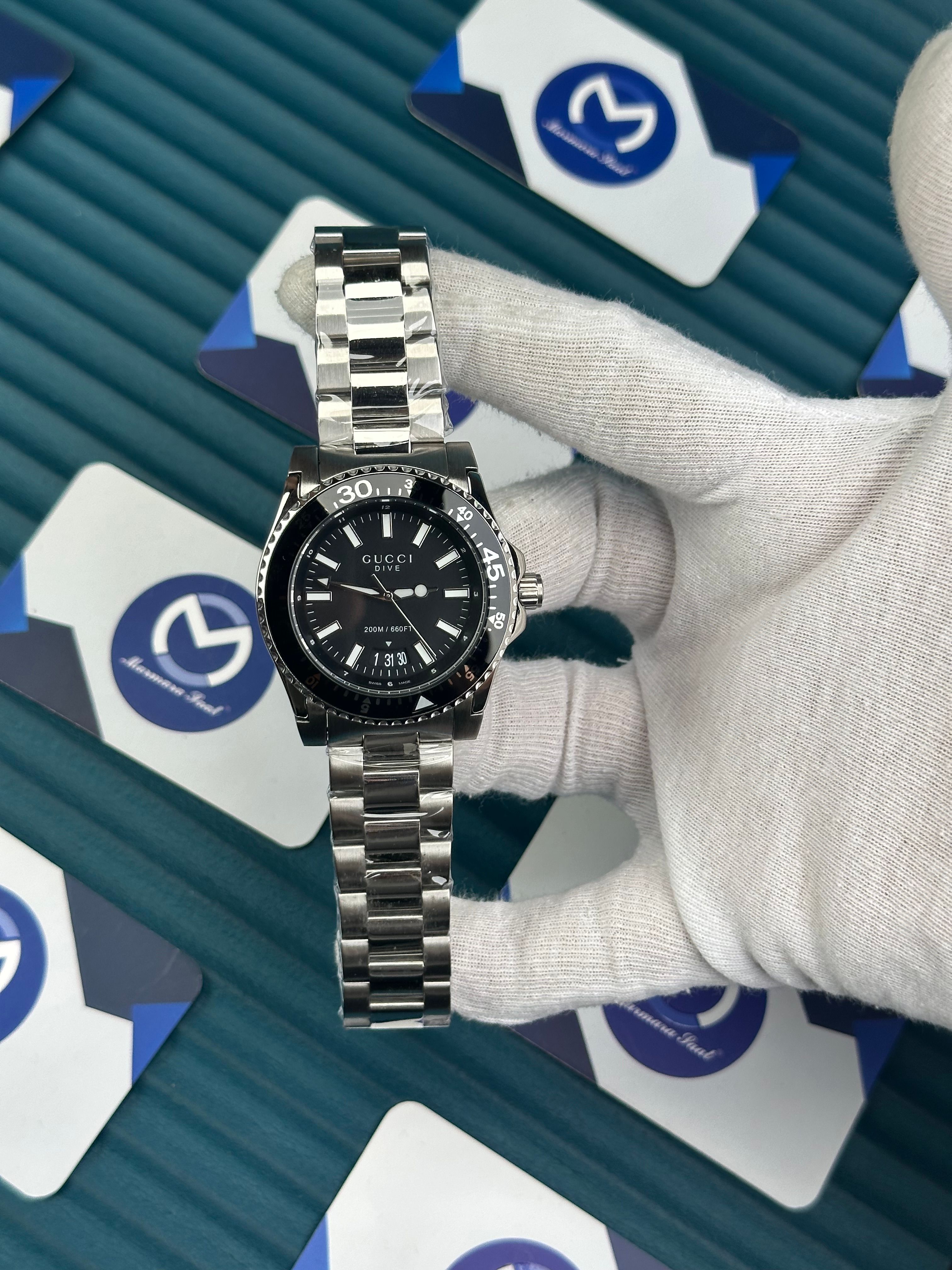 GUCCI BLACK DIAL PHOSPHOROUS INDEX SILVER CORD