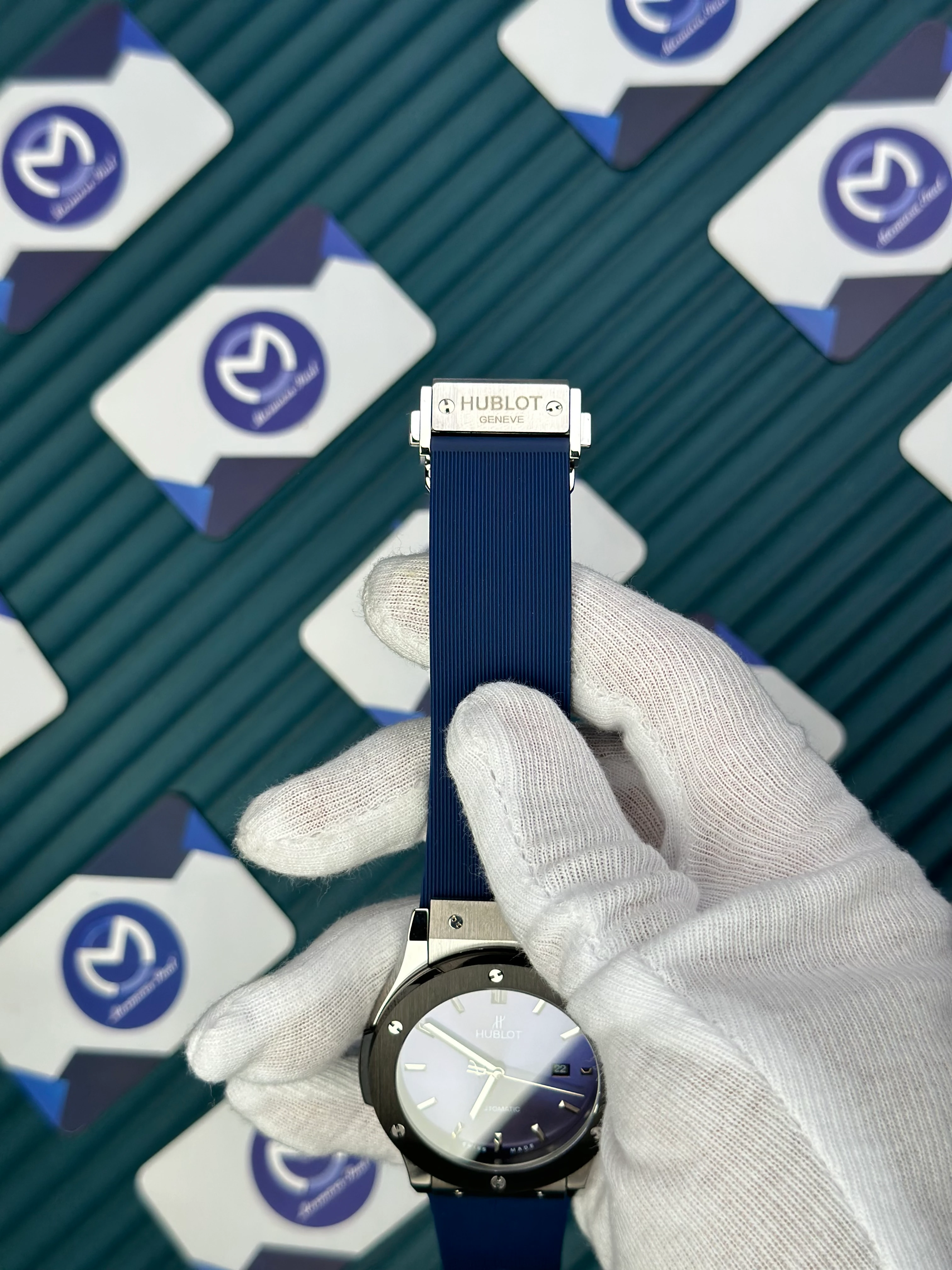 HUBLOT GENEVE AUTOMATIC VENDOME BLUE DIAL SILVER CASE BLACK BEZEL BLUE RUBBER CORD