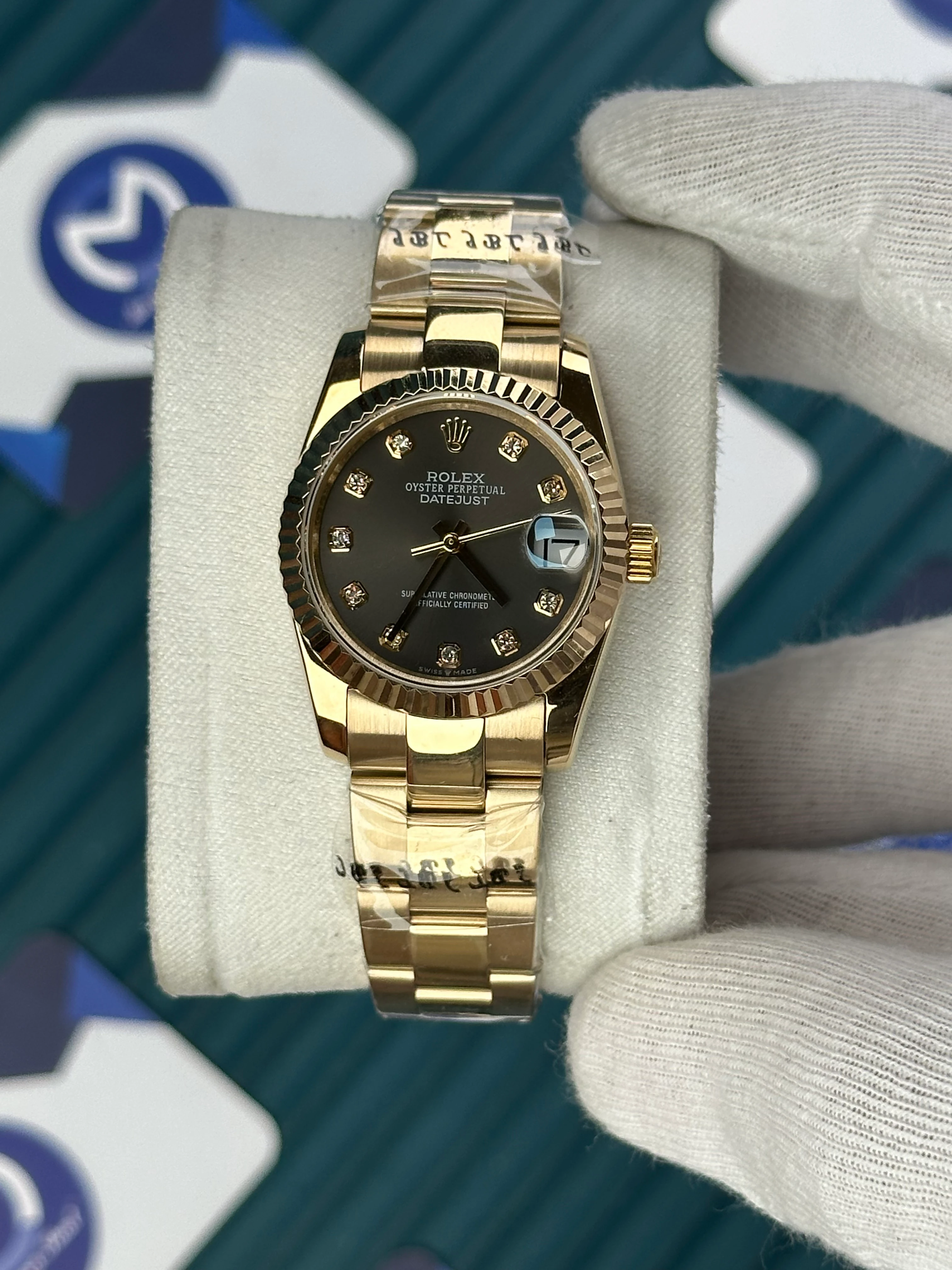 ROLEX 31 MM DATEJUST GREY DIAL DIAMOND INDEX GOLD OYSTER 