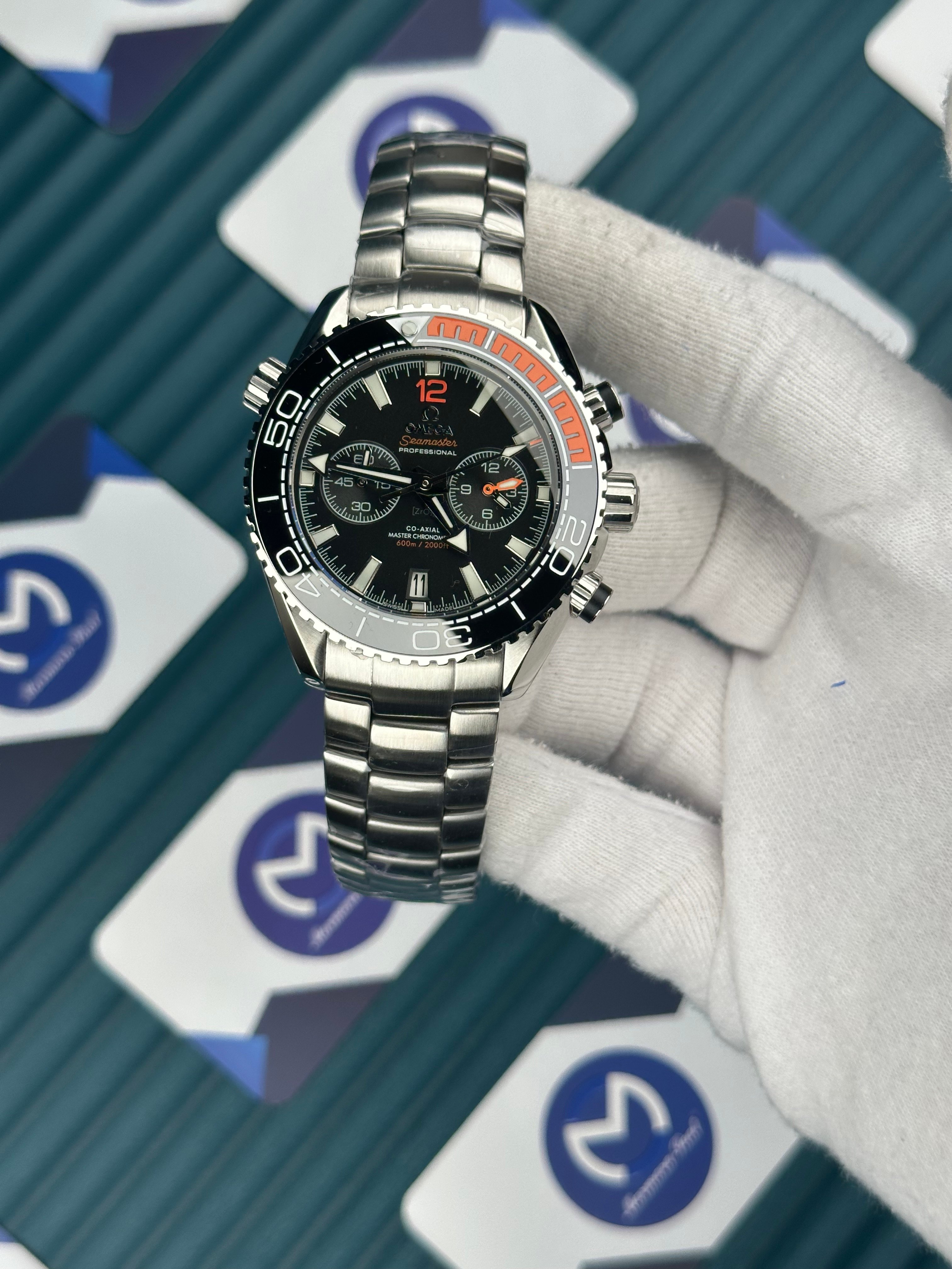 Omega Seamaster Planet Ocean Turuncu Siyah Bezel Fonksiyonlu Siyah Kadran