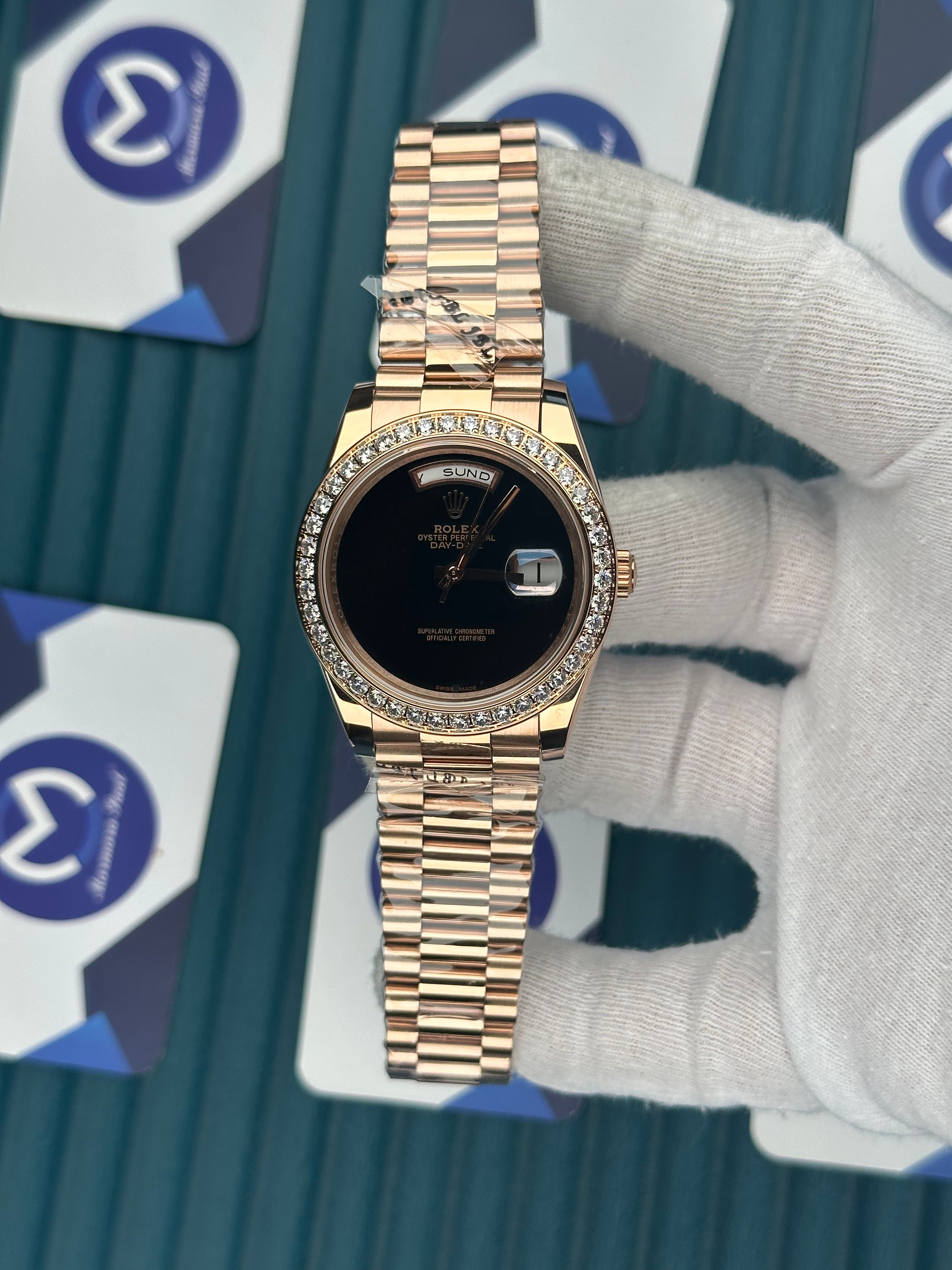 ROLEX DAY-DATE BLACK DIAL DIAMOND BEZEL ROSE PRESIDENT