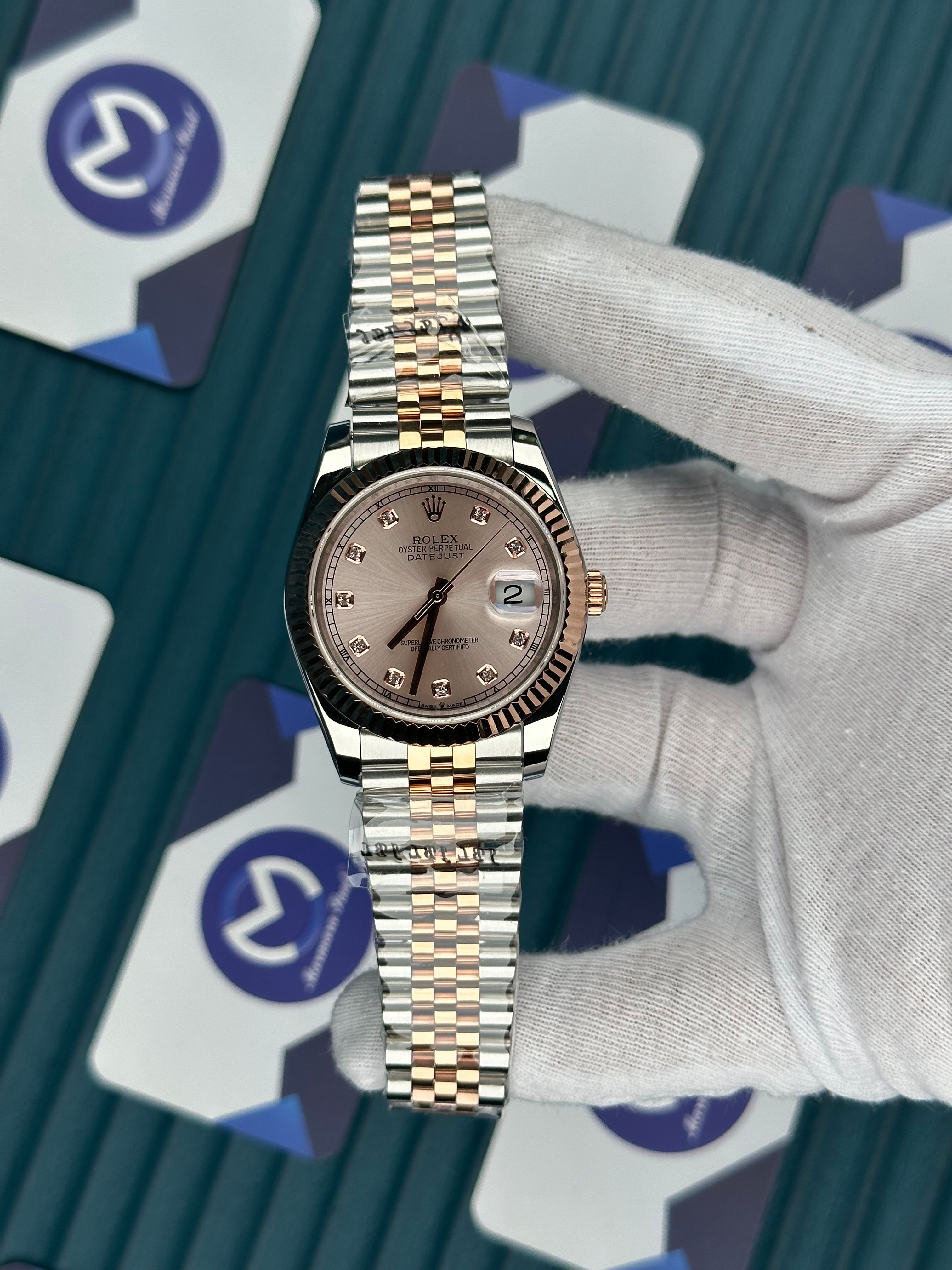 ROLEX DATEJUST CHAMPAGNE DIAL DIAMOND INDEX ROSE-SILVER JUBILE