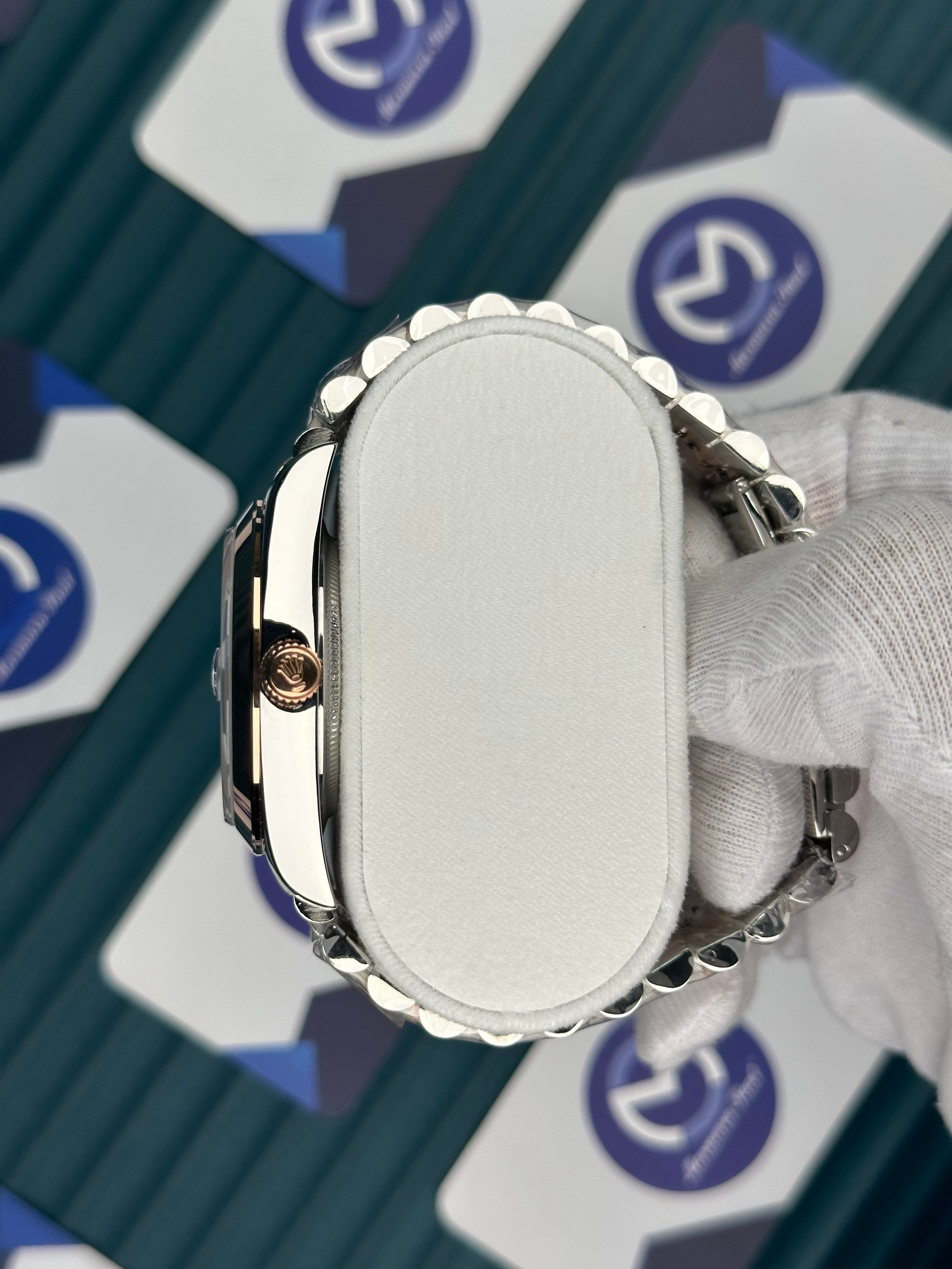 ROLEX DAY-DATE CHOCOLATE OVAL BEZEL ROSE-SILVER PRESIDENT