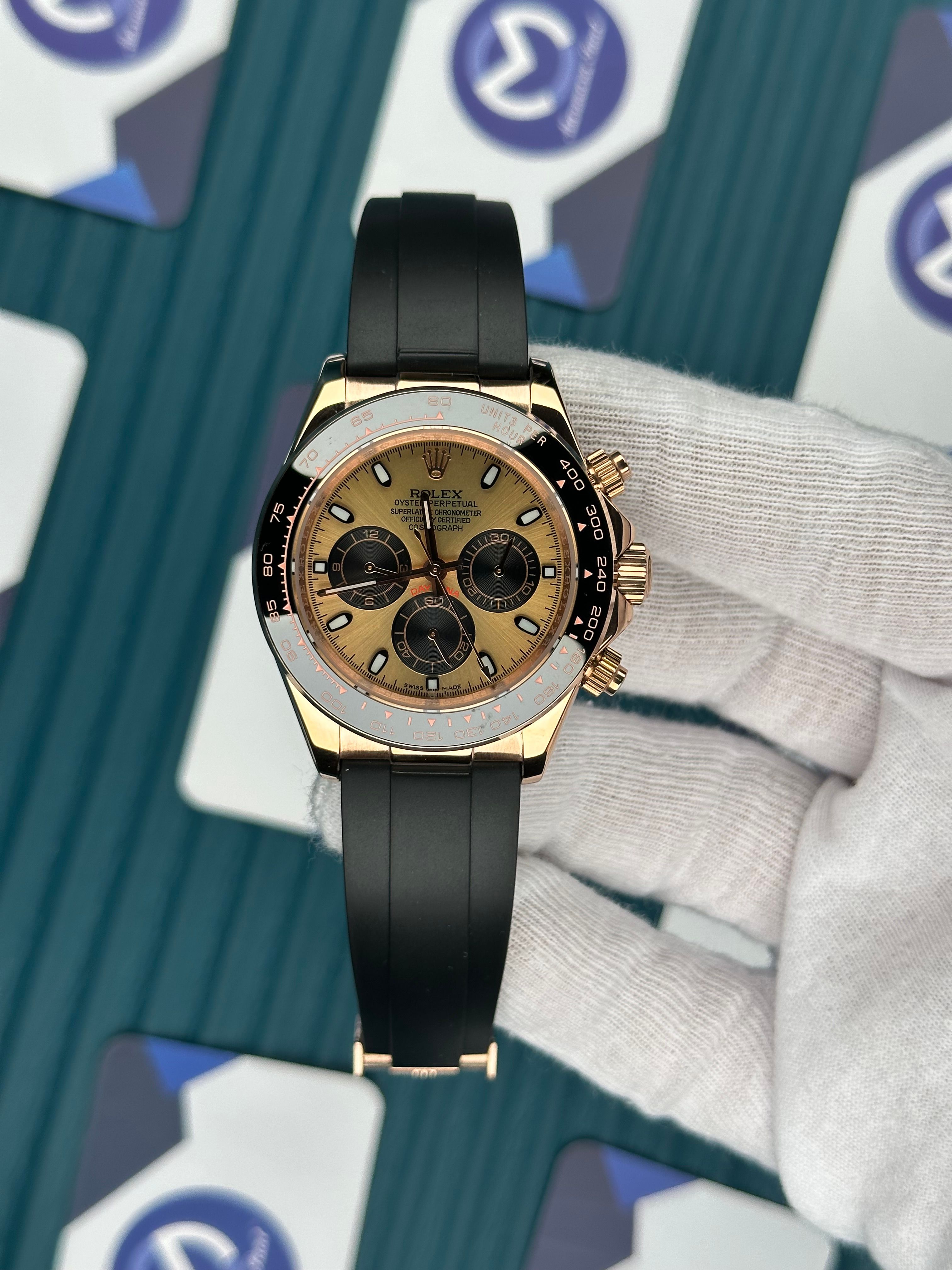 ROLEX DAYTONA CHAMPAGNE DIAL ROSE CASE OYSTERFLEX