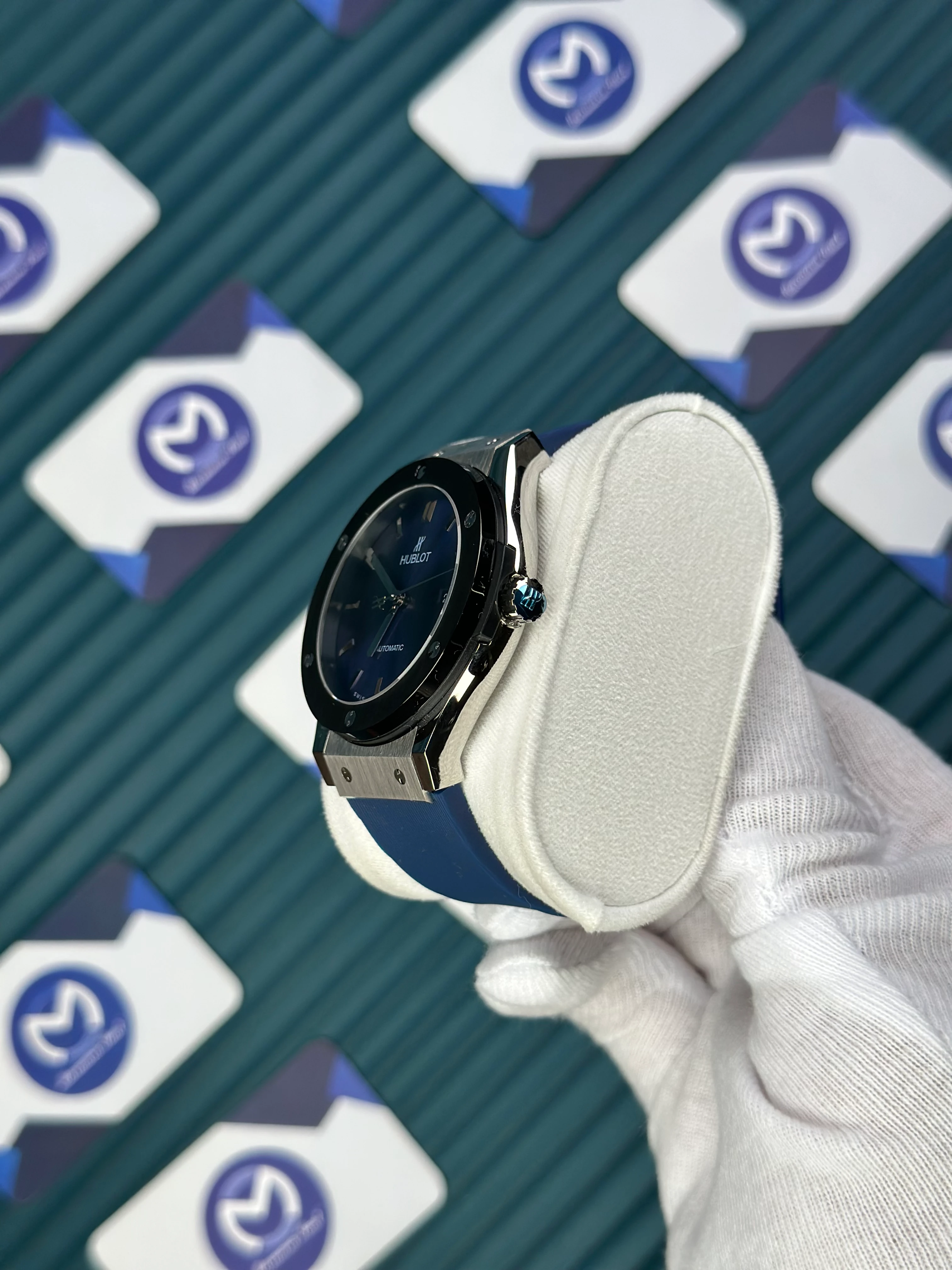 HUBLOT GENEVE AUTOMATIC VENDOME BLUE DIAL SILVER CASE BLACK BEZEL BLUE RUBBER CORD