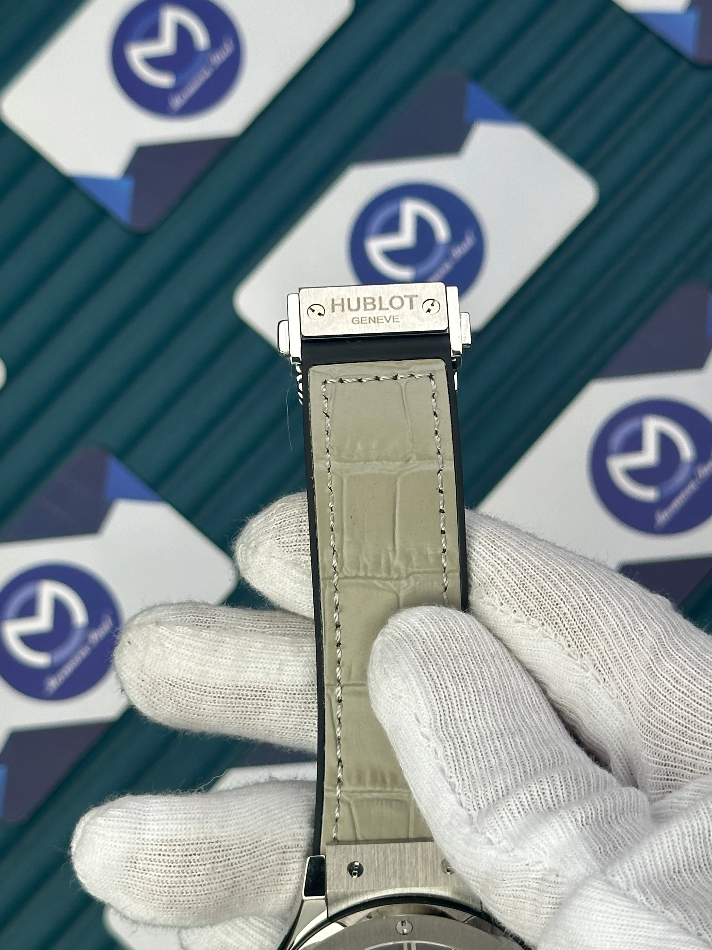 HUBLOT GENEVE AUTOMATIC NAVY GREY DIAL AND CASE GREY LEATHER CORD 