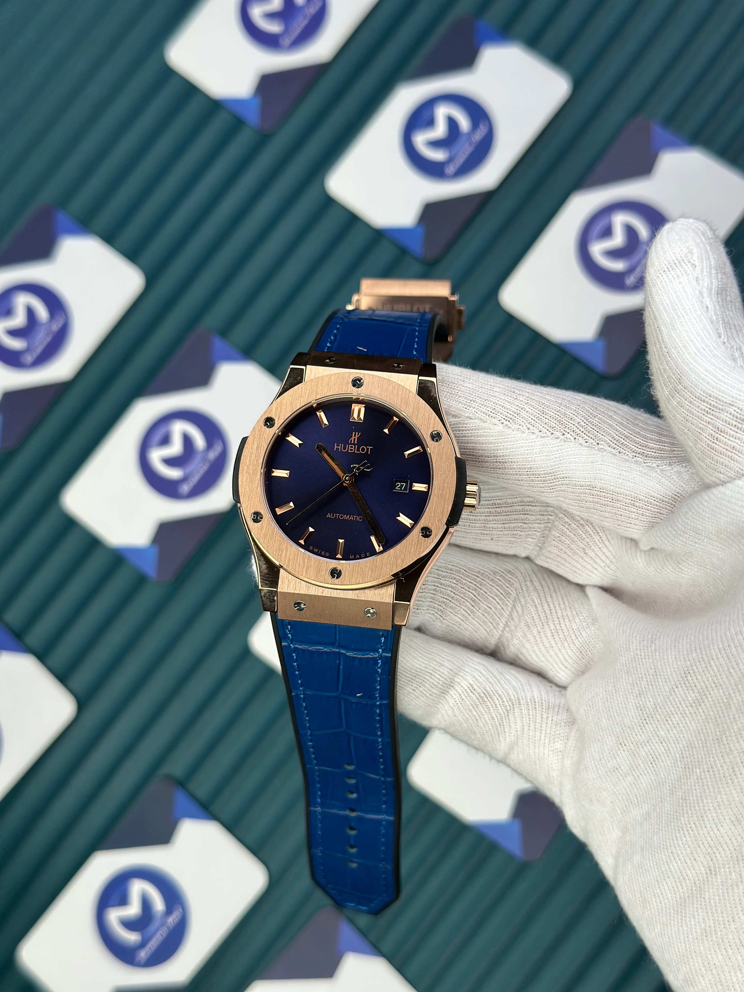 HUBLOT GENEVE AUTOMATIC VENDOME BLUE DIAL AND LEATHER CORD ROSE CASE