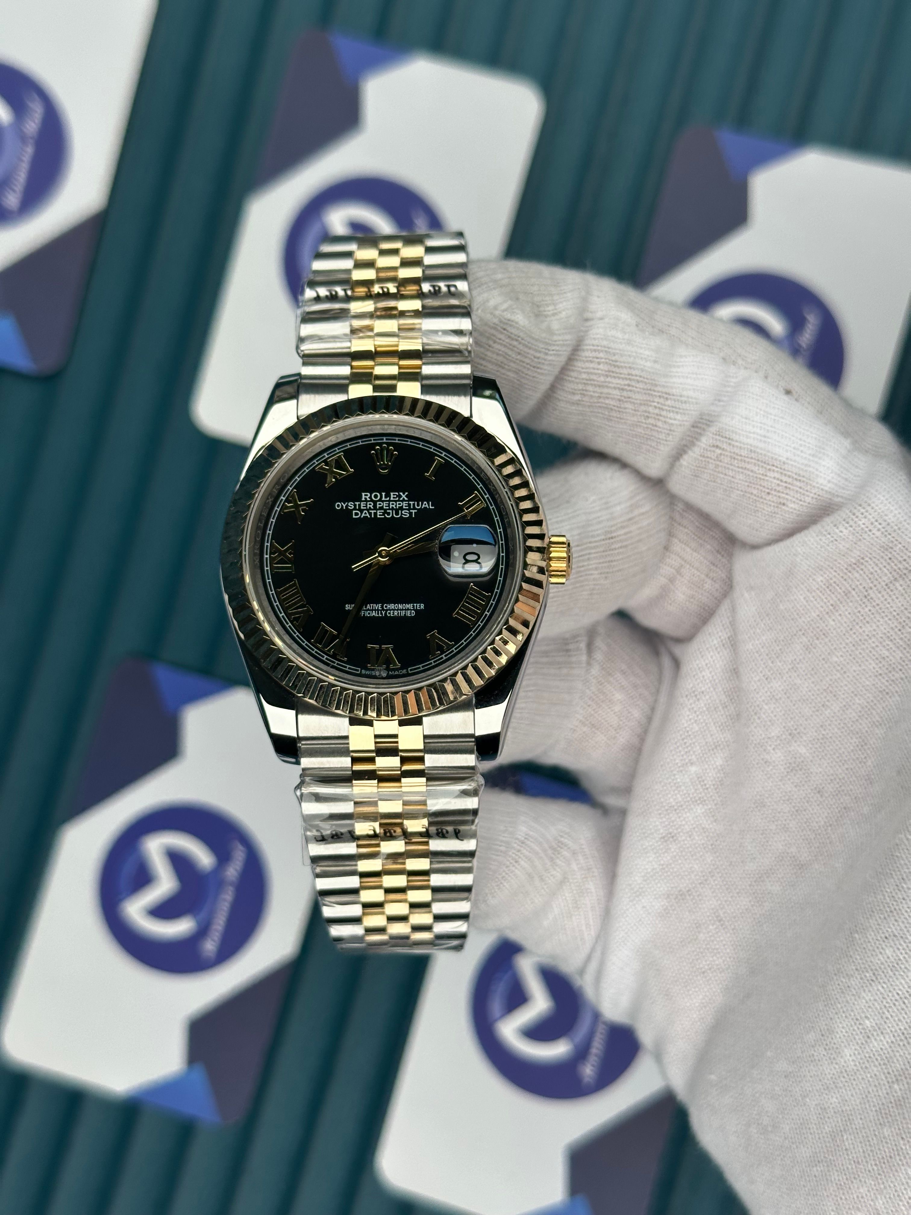 ROLEX DATEJUST GOLD ROMA INDEX BLACK DIAL GOLD-SILVER JUBILE