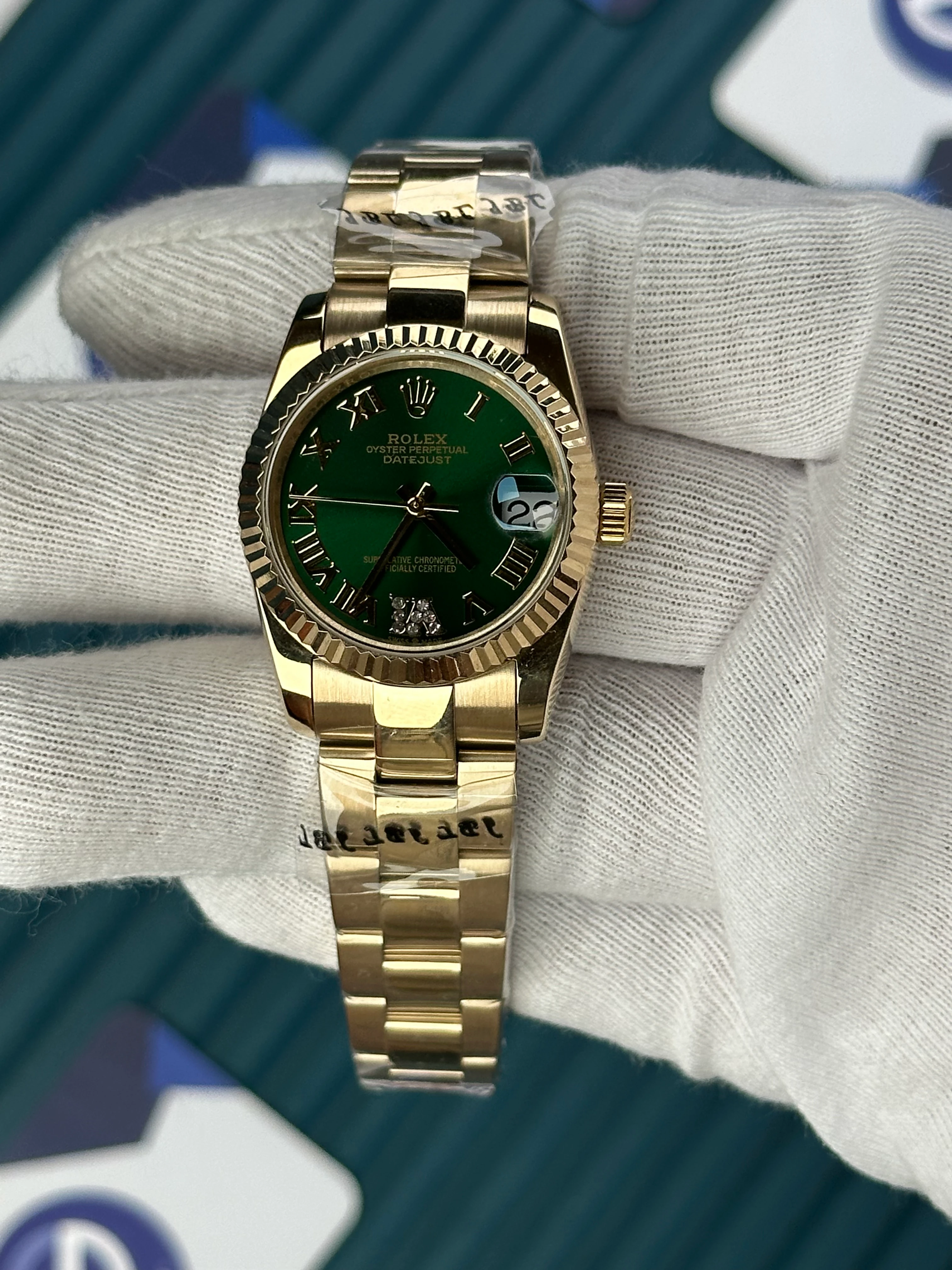 ROLEX 31 MM DATEJUST GREEN DIAL ROMA INDEX GOLD OYSTER 