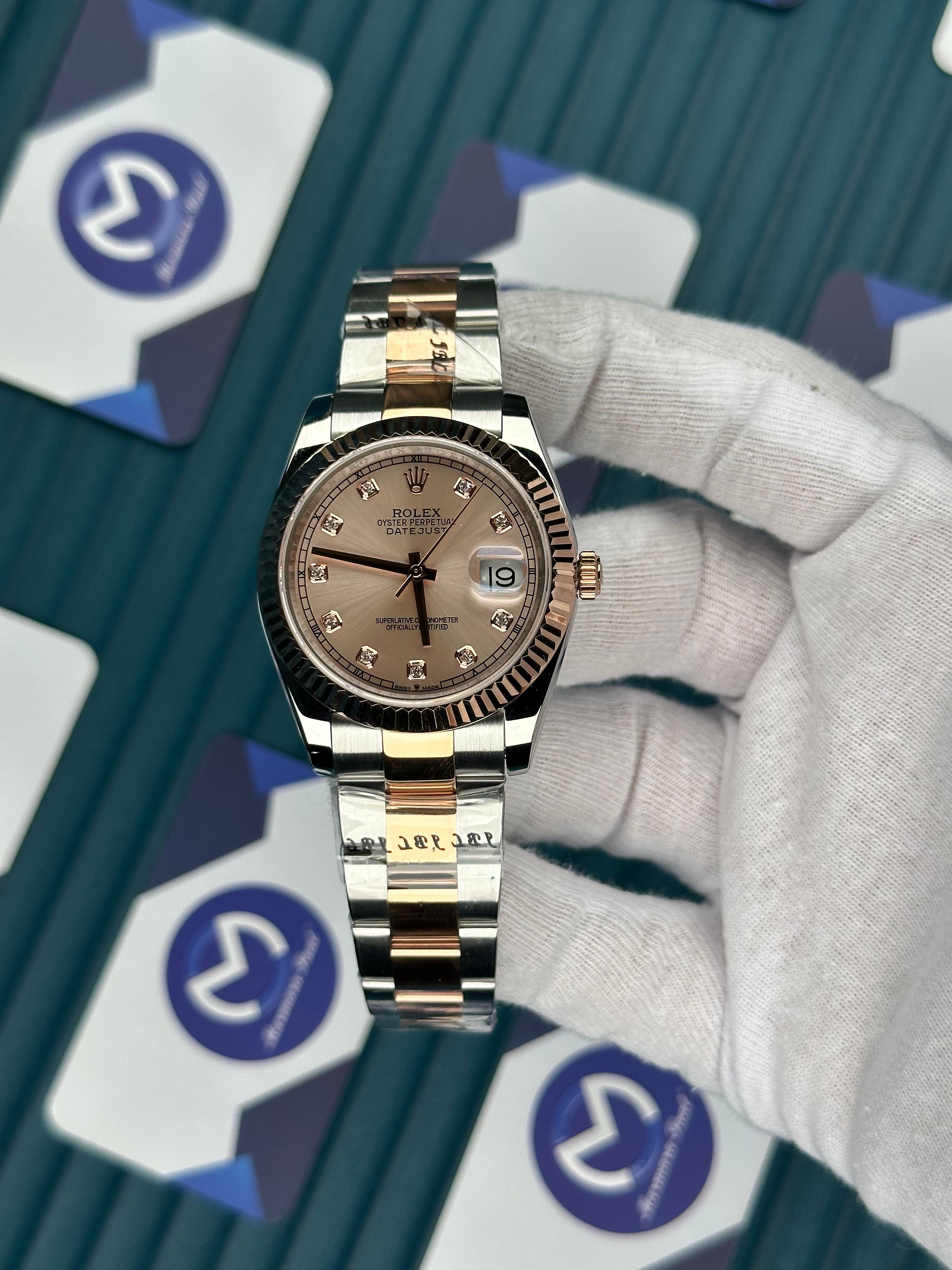 ROLEX DATEJUST CHAMPAGNE DIAL DIAMOND INDEX ROSE-SILVER OYSTER