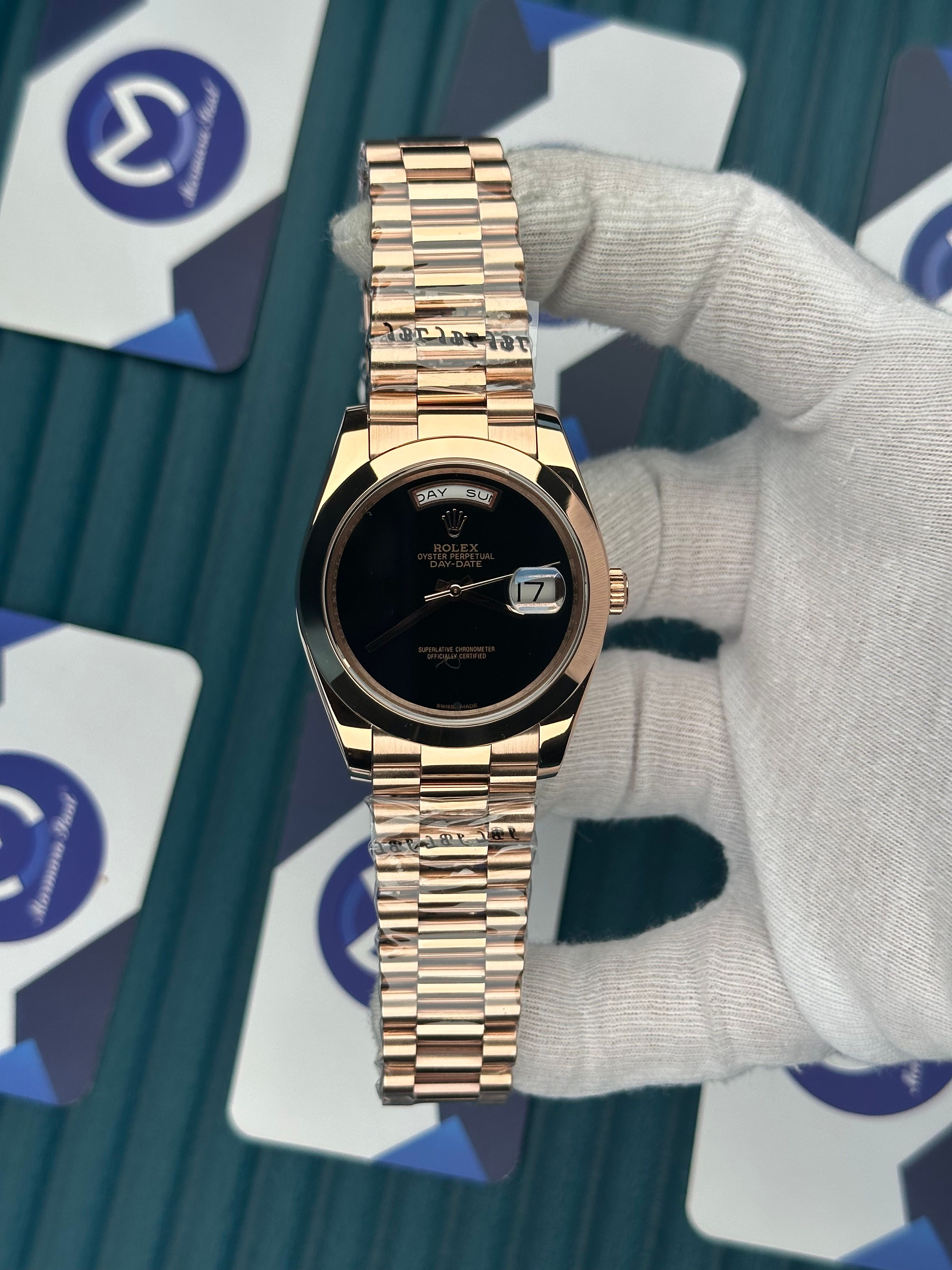 ROLEX DAY-DATE BLACK DIAL NO INDEX OVAL BEZEL ROSE PRESIDENT
